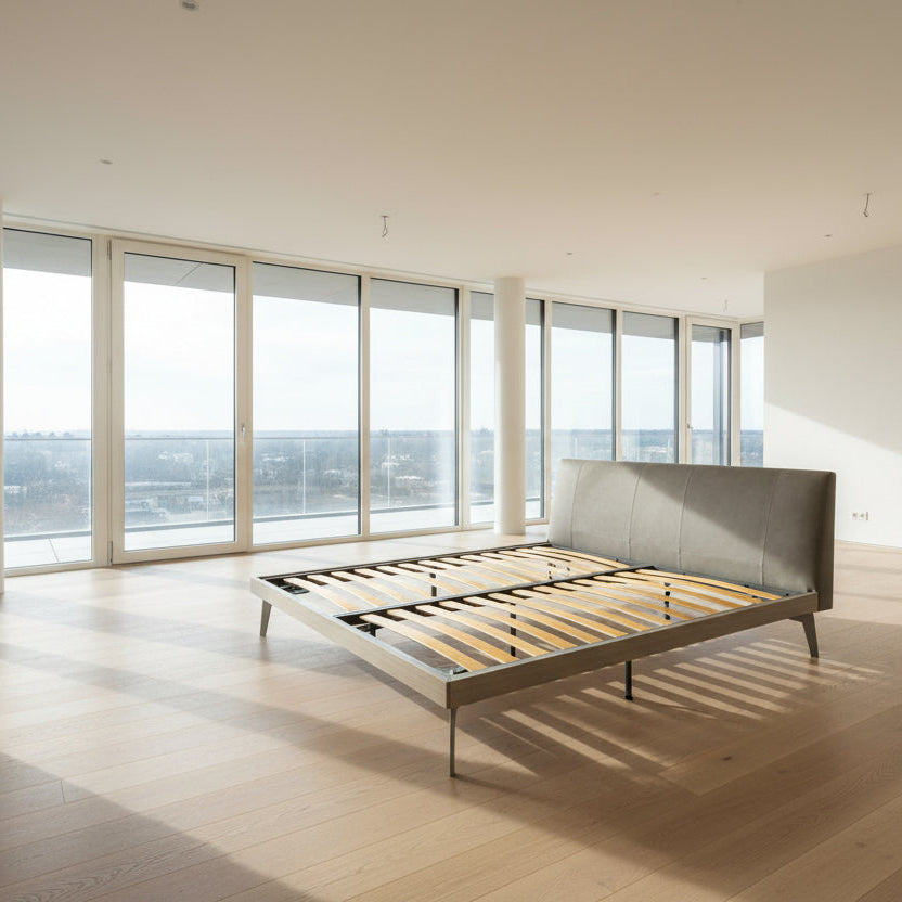 The San Giacomo Aliante King Size Bed by Sangiacomo features an upholstered headboard and exposed yellow slats, displayed on a white background. No mattress is included.