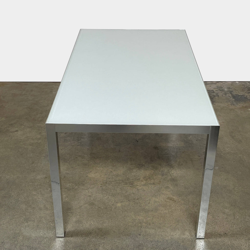 The MDF Italia Limn 04 Rectangle Dining Table by MDF Italia is a sleek and minimalist rectangle table. Its white color seamlessly blends with any modern decor, making it a perfect addition to any dining room.