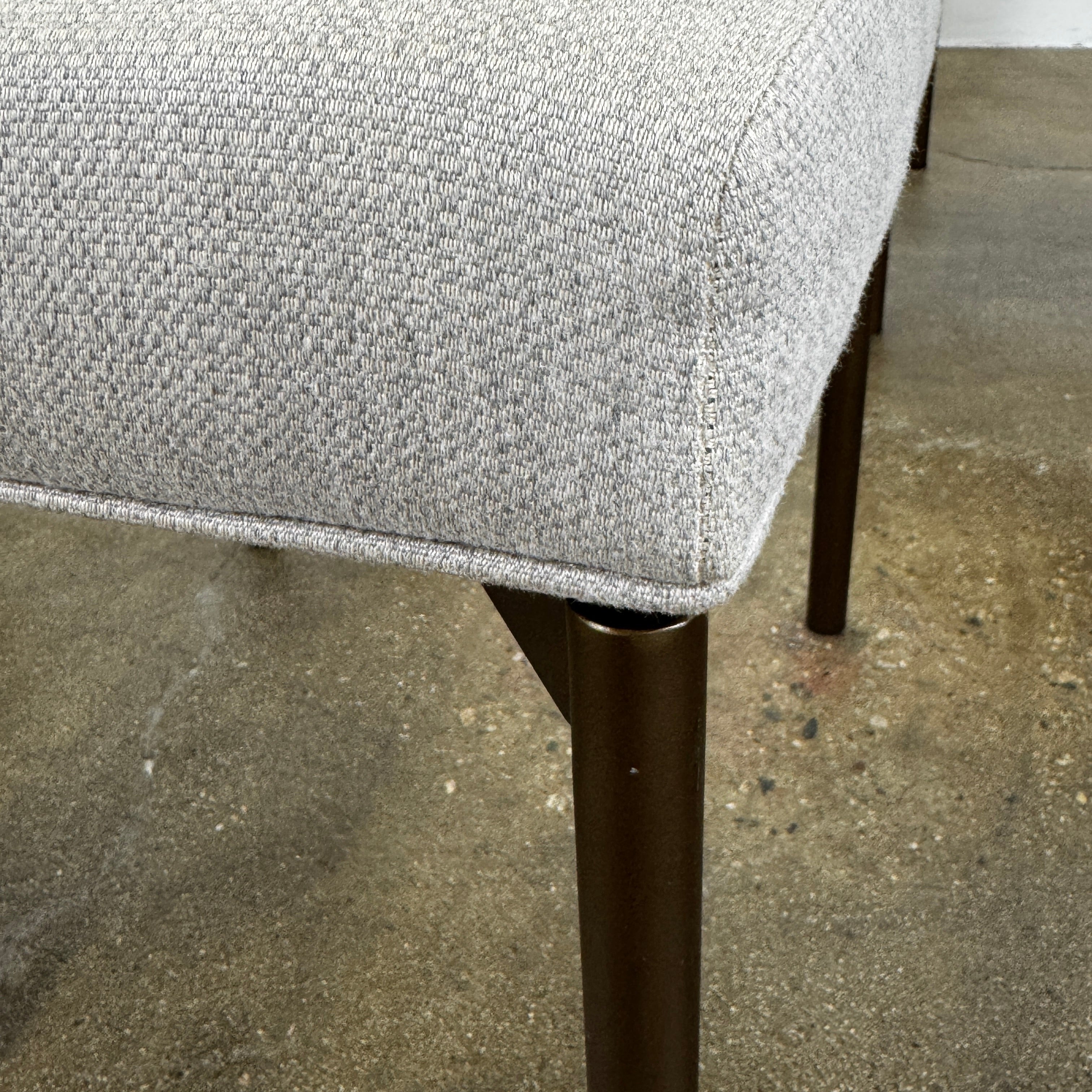 Five Mitchell Gold + Bob Williams Remy dining chairs, upholstered in high-performance fabric with dark metal legs, are arranged in two rows on a plain white background.