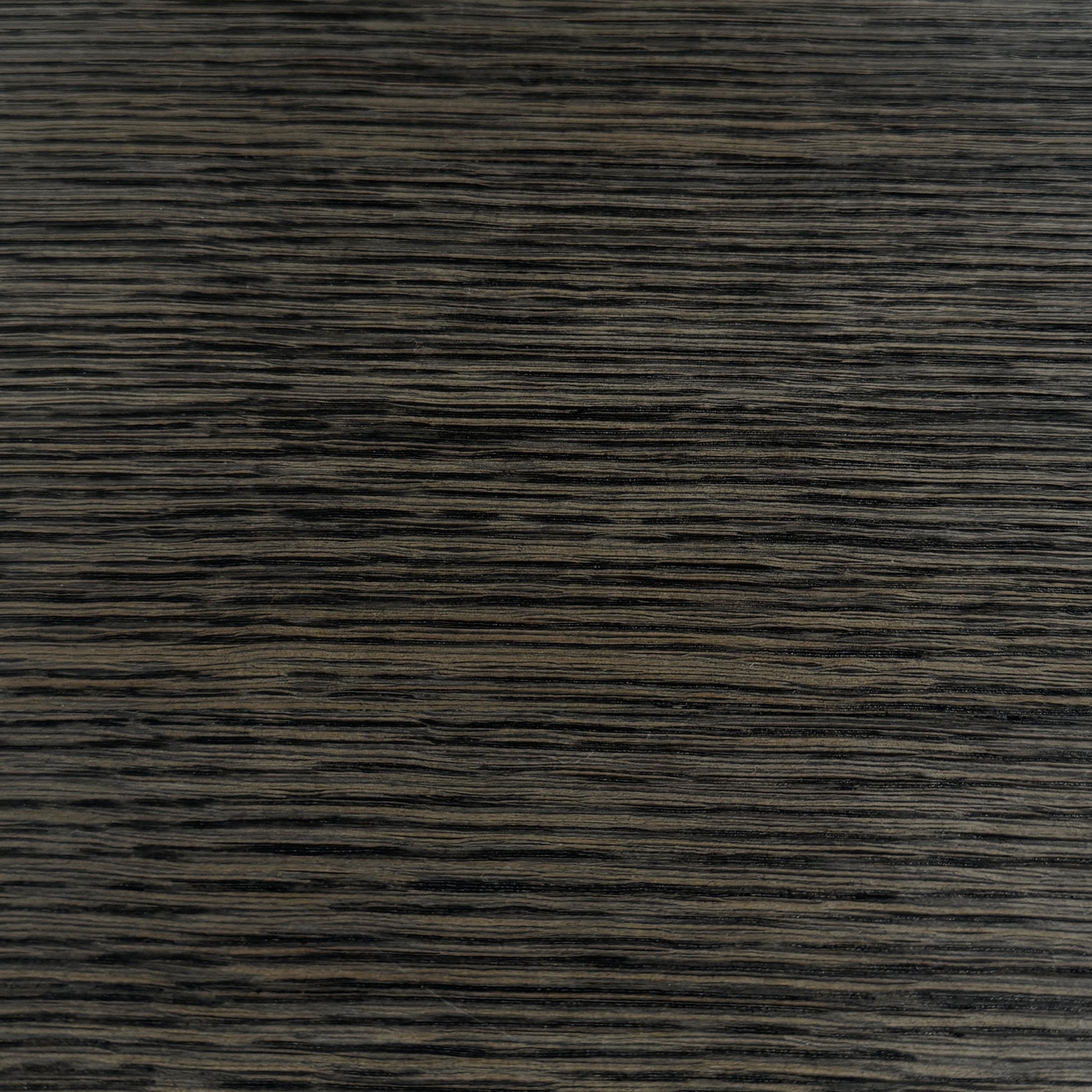 The Maxalto Max Table Grey Oak by Maxalto features a grey oak wooden top, metal legs, and an angular modern design—ideal for enhancing any dining space. Displayed on a plain white background.