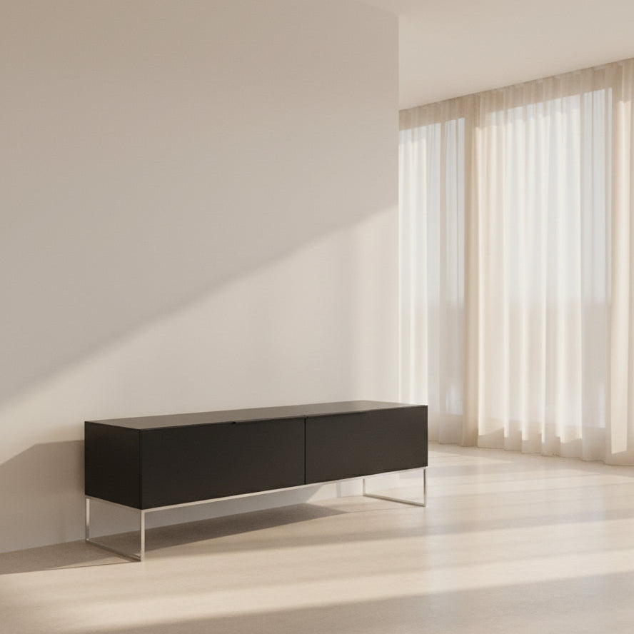 The B&B Italia Athos Console features a modern black rectangular design with a glossy finish and metal legs, showcased against a plain white background.
