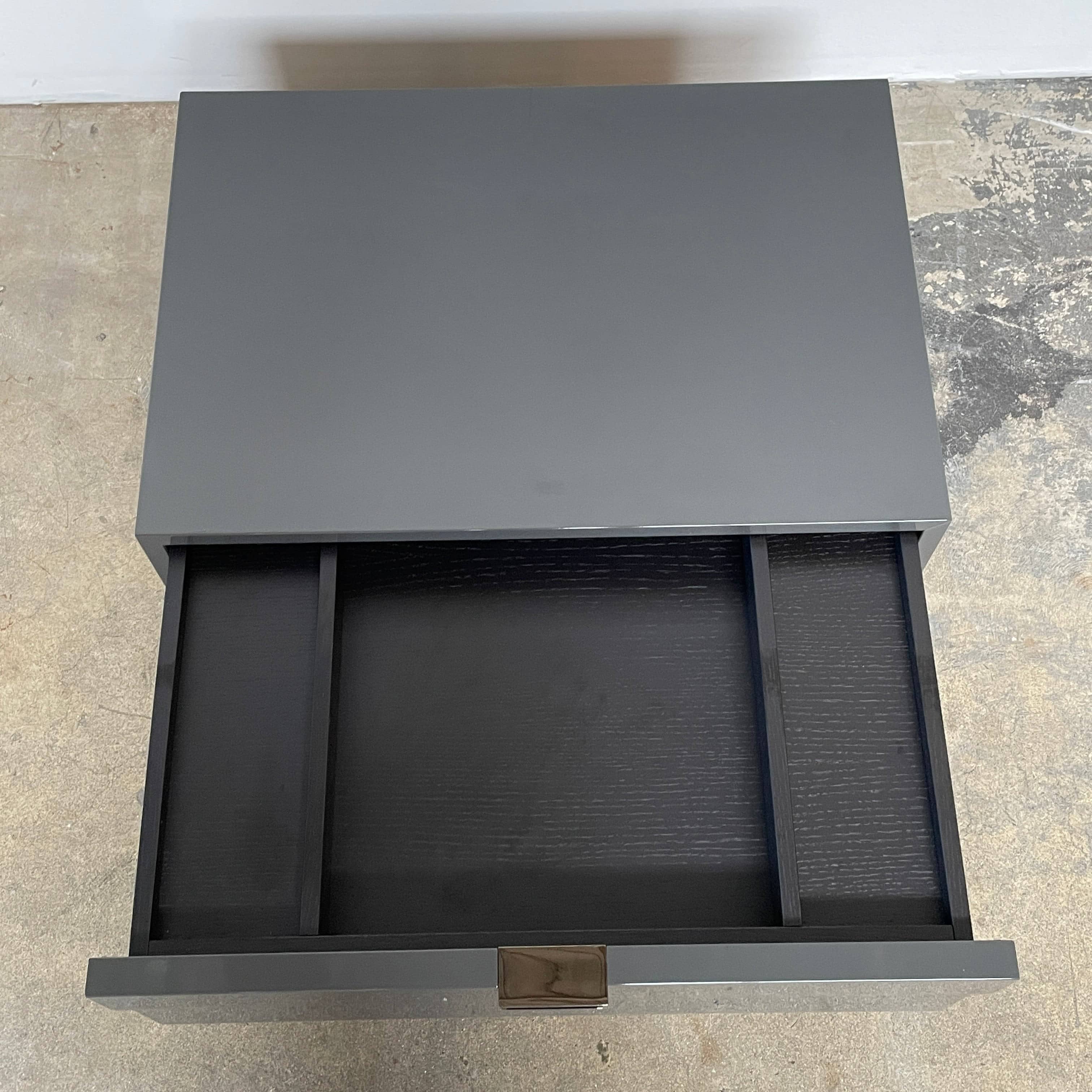 A pair of Minotti Harvey nightstand sets with drawers.