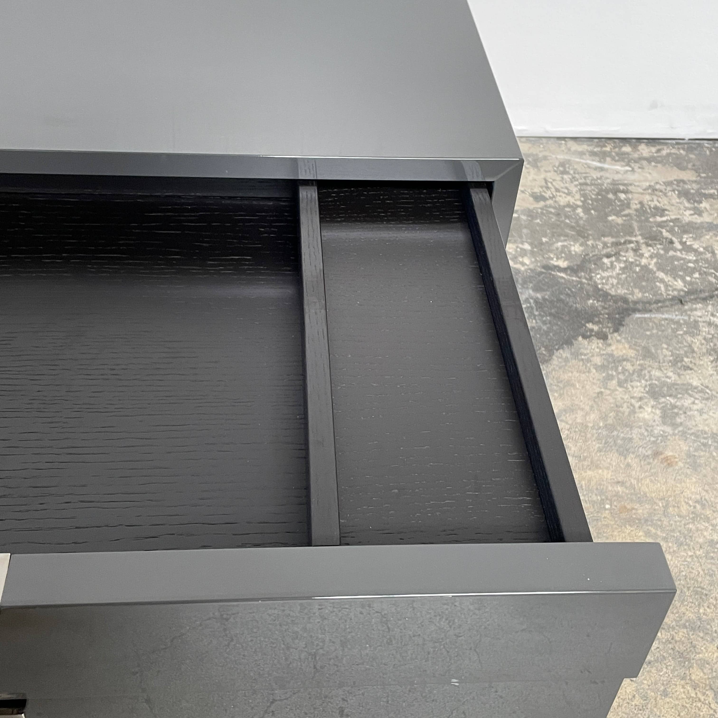 A pair of Minotti Harvey nightstand sets with drawers.