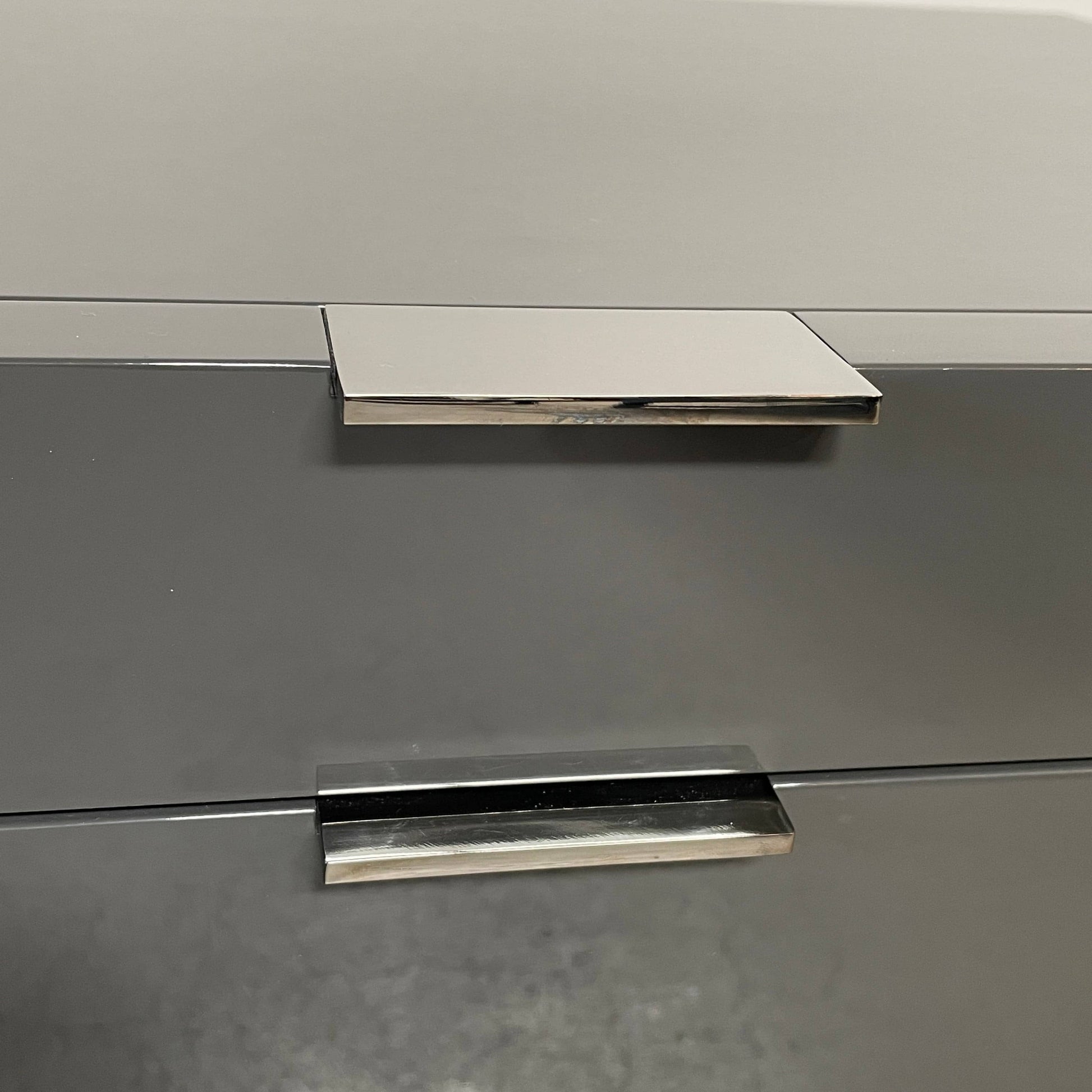 A pair of Minotti Harvey nightstand sets with drawers.