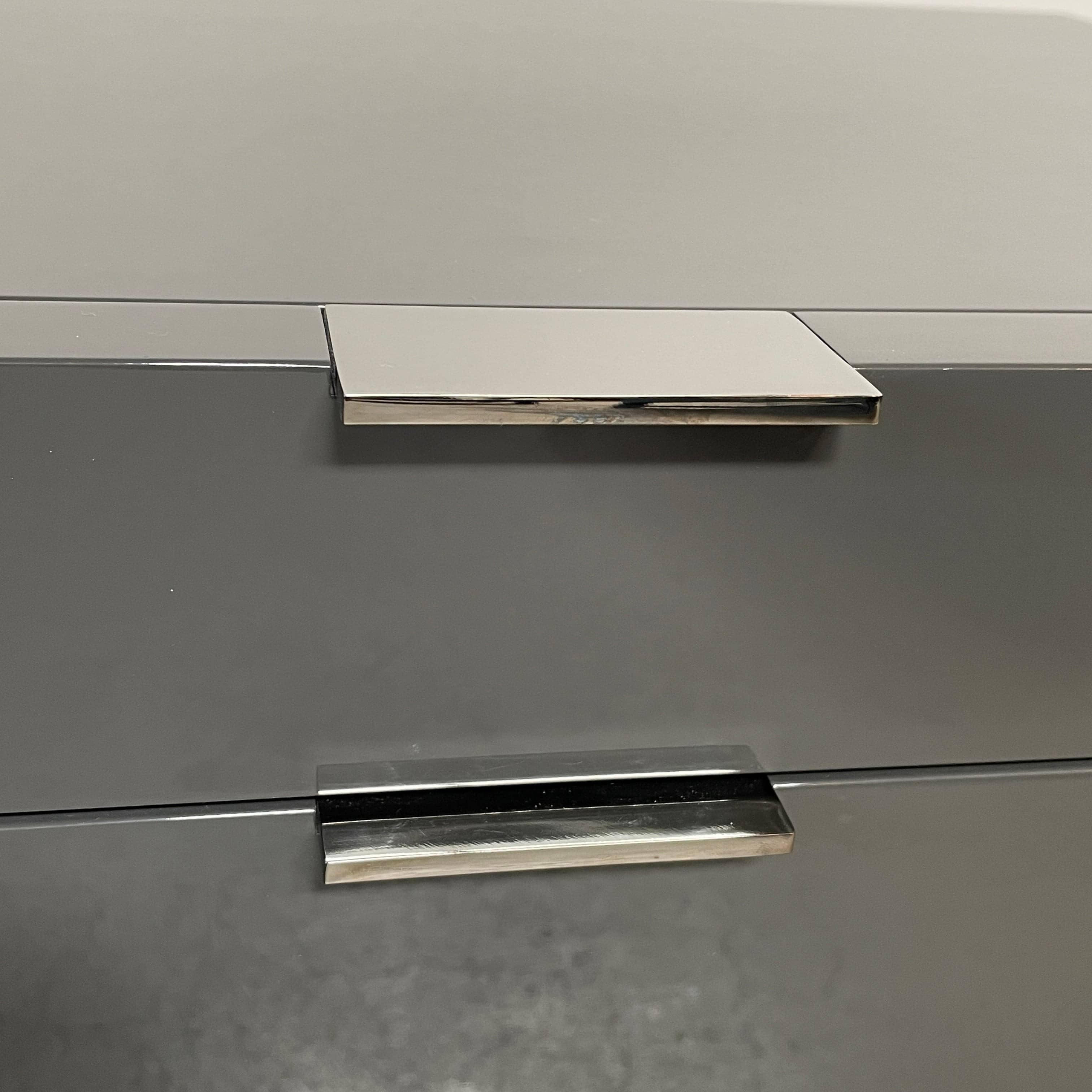 A pair of Minotti Harvey nightstand sets with drawers.