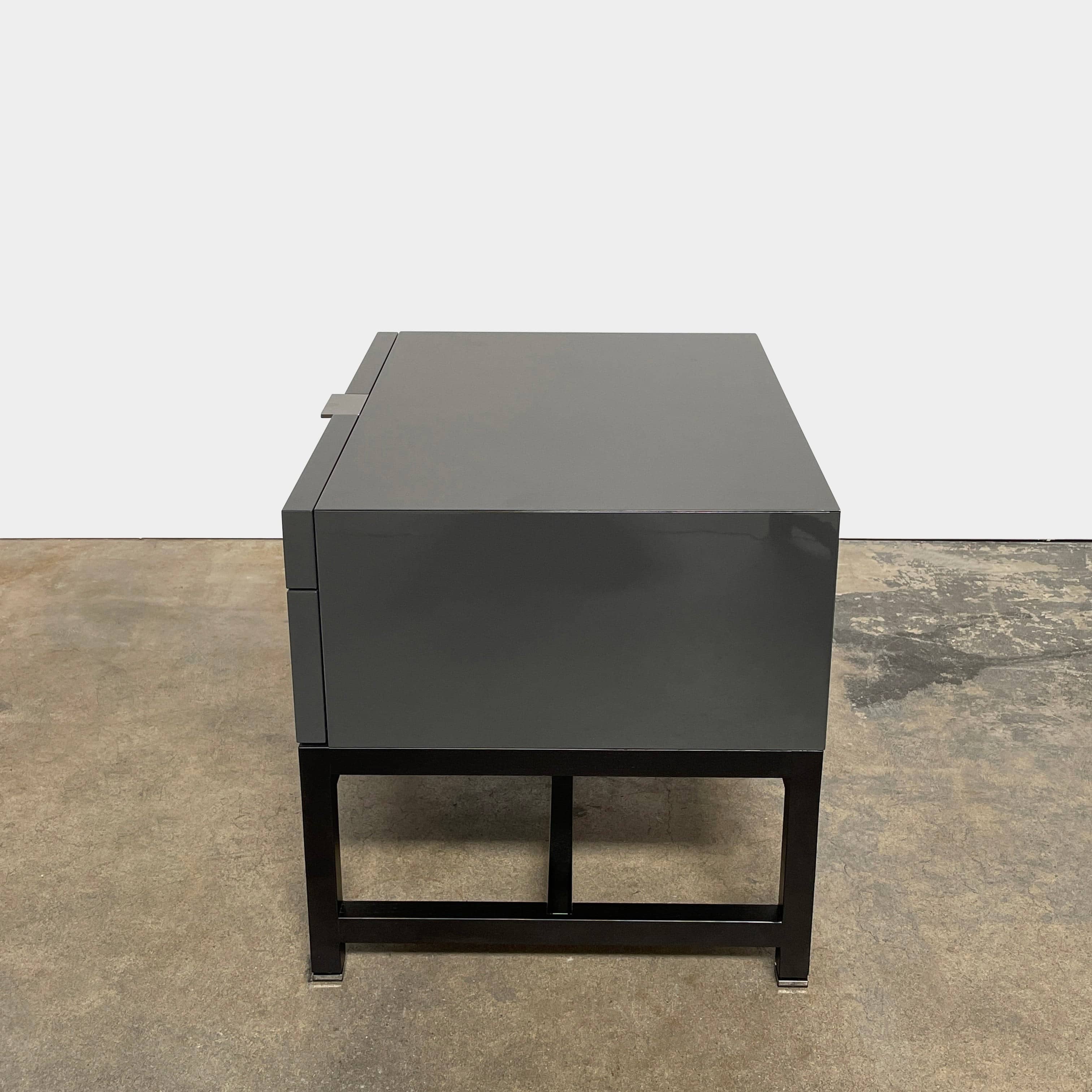 A pair of Minotti Harvey nightstand sets with drawers.