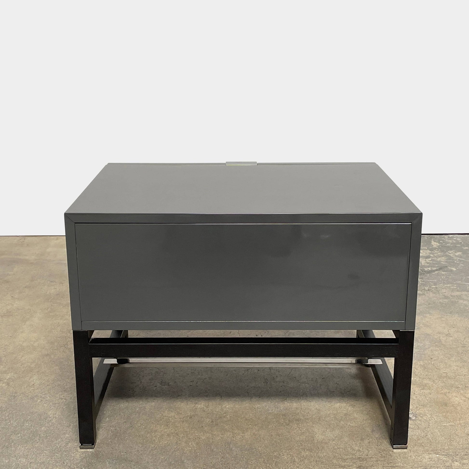 A pair of Minotti Harvey nightstand sets with drawers.