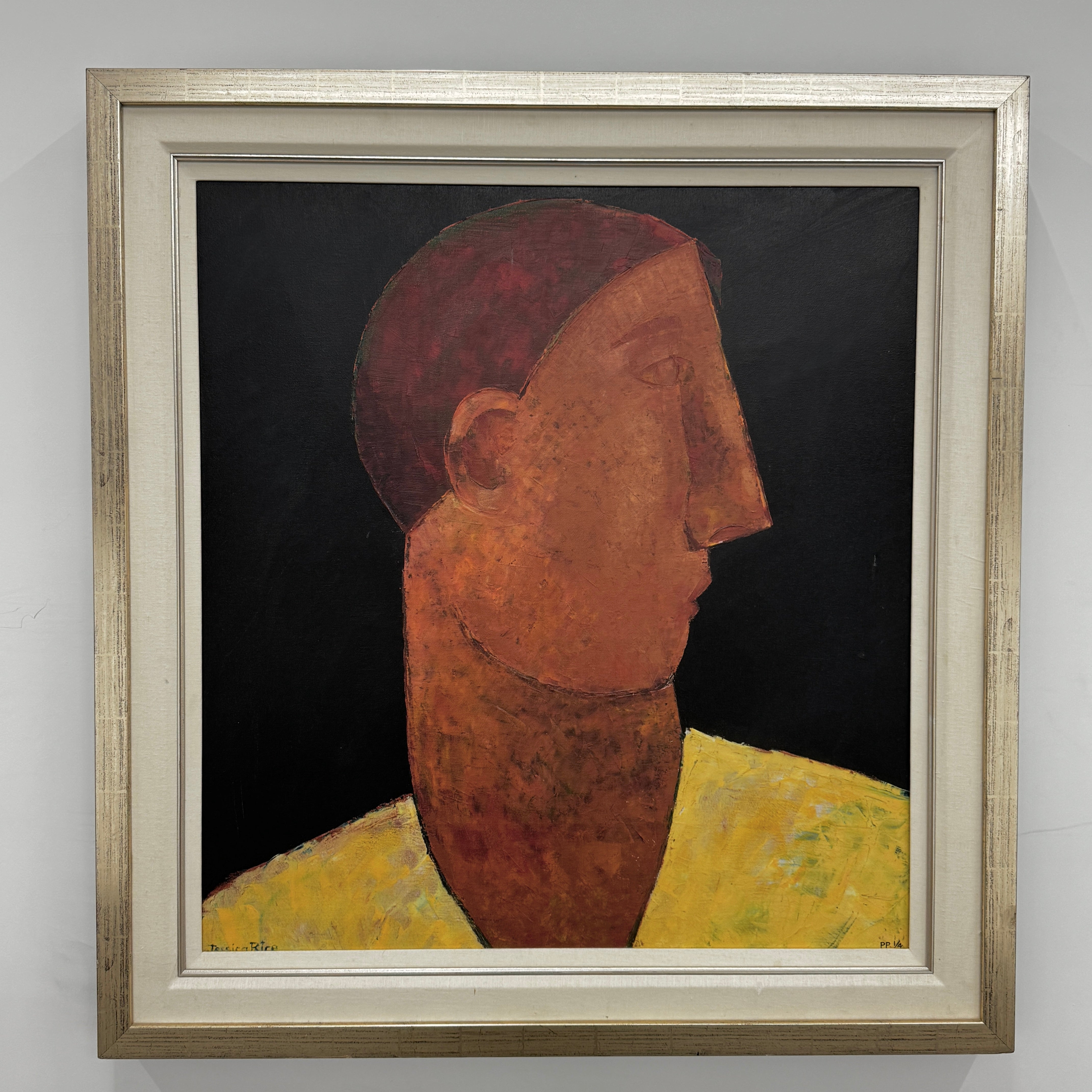 Luis by Jessica Rice is a striking framed limited edition print from Artist, depicting a person with a long nose and red-brown skin in profile against a black background, wearing a yellow shirt.