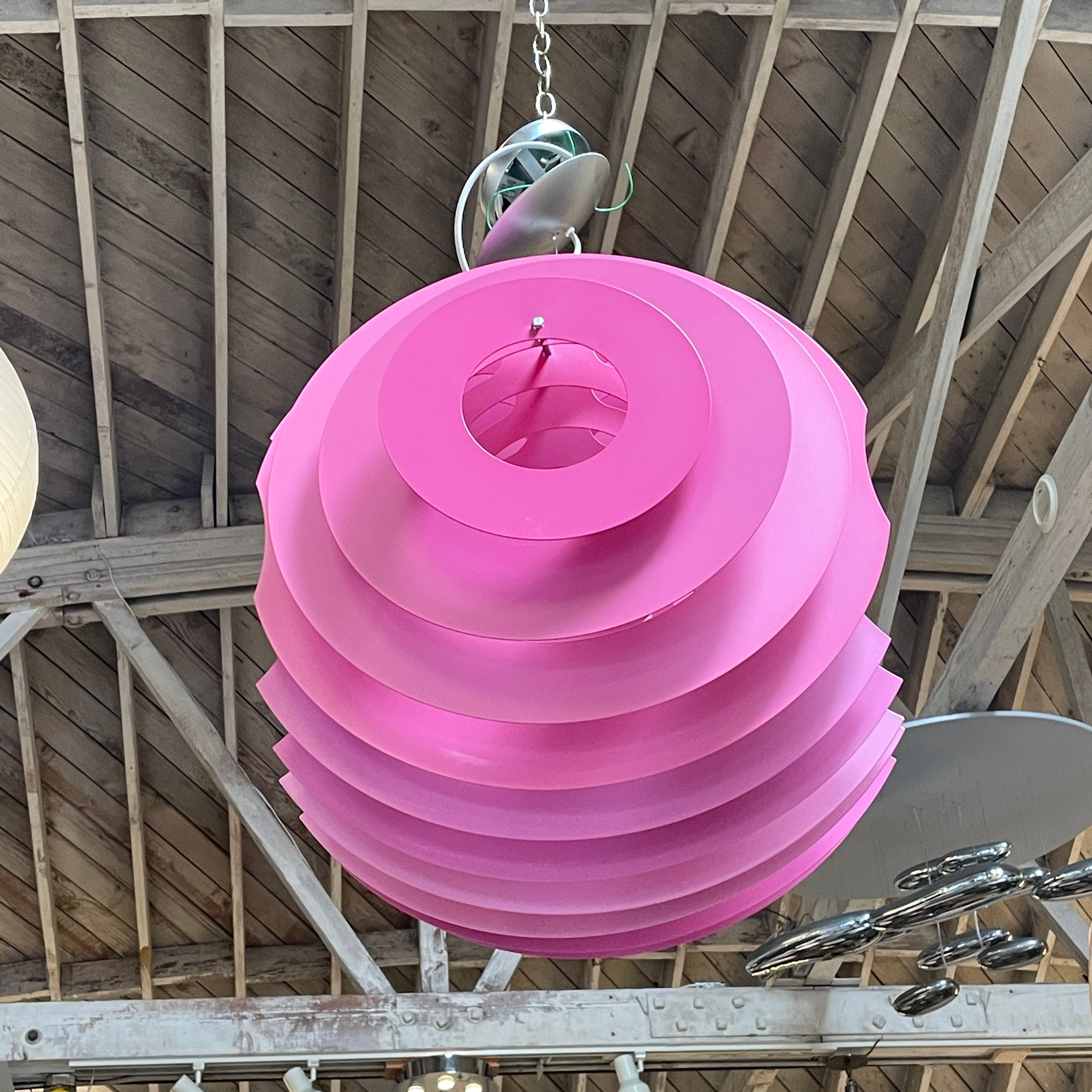 Modern Foscarini Supernova purple pendant light with concentric circular design.