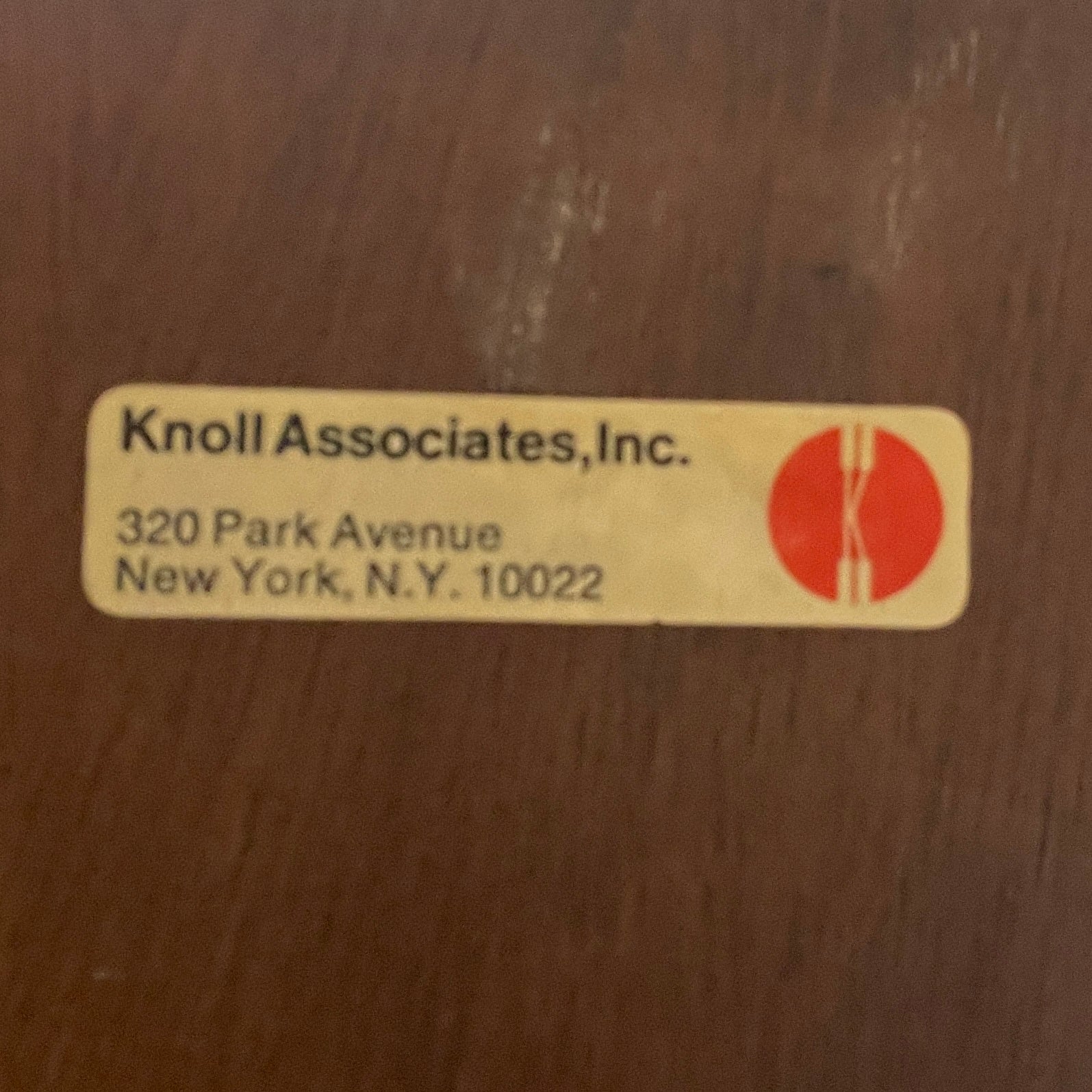 The Knoll Vintage Florence Knoll Office Storage features a dark wood frame, white sliding doors, and metal legs—perfect as a stylish credenza or office storage against a plain white wall.