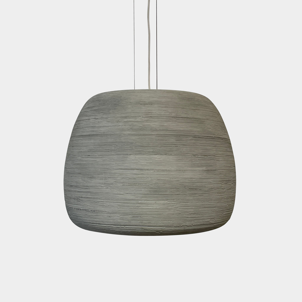 A Ceramic Hanging Pendant Light Moooi by Foundry hanging from a white wall.