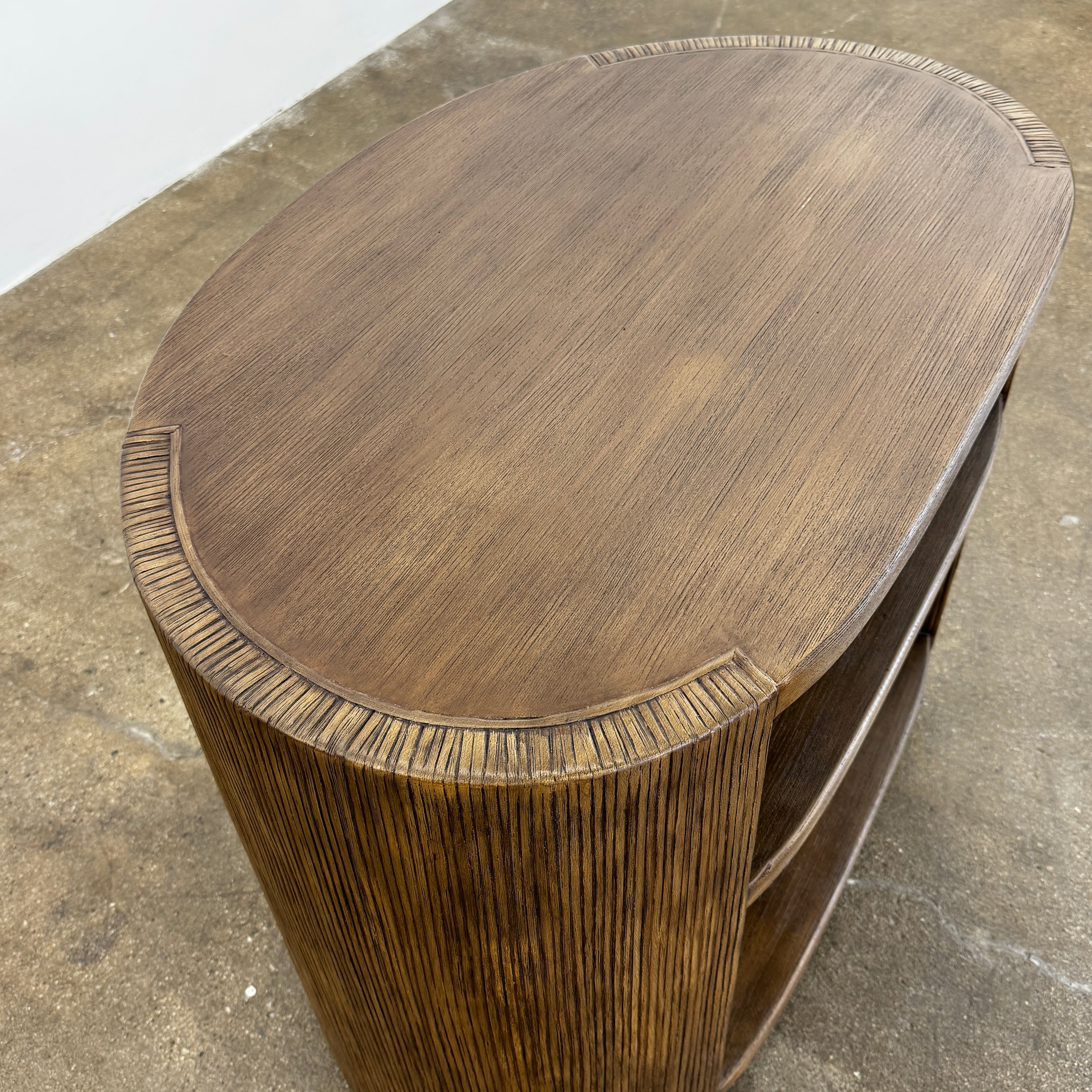 The Palachek Leonardo Side Table, Large, by Palachek features artisan craftsmanship, a dark brown finish, two shelves, and an open minimalist design that suits any contemporary decor against a plain white background.