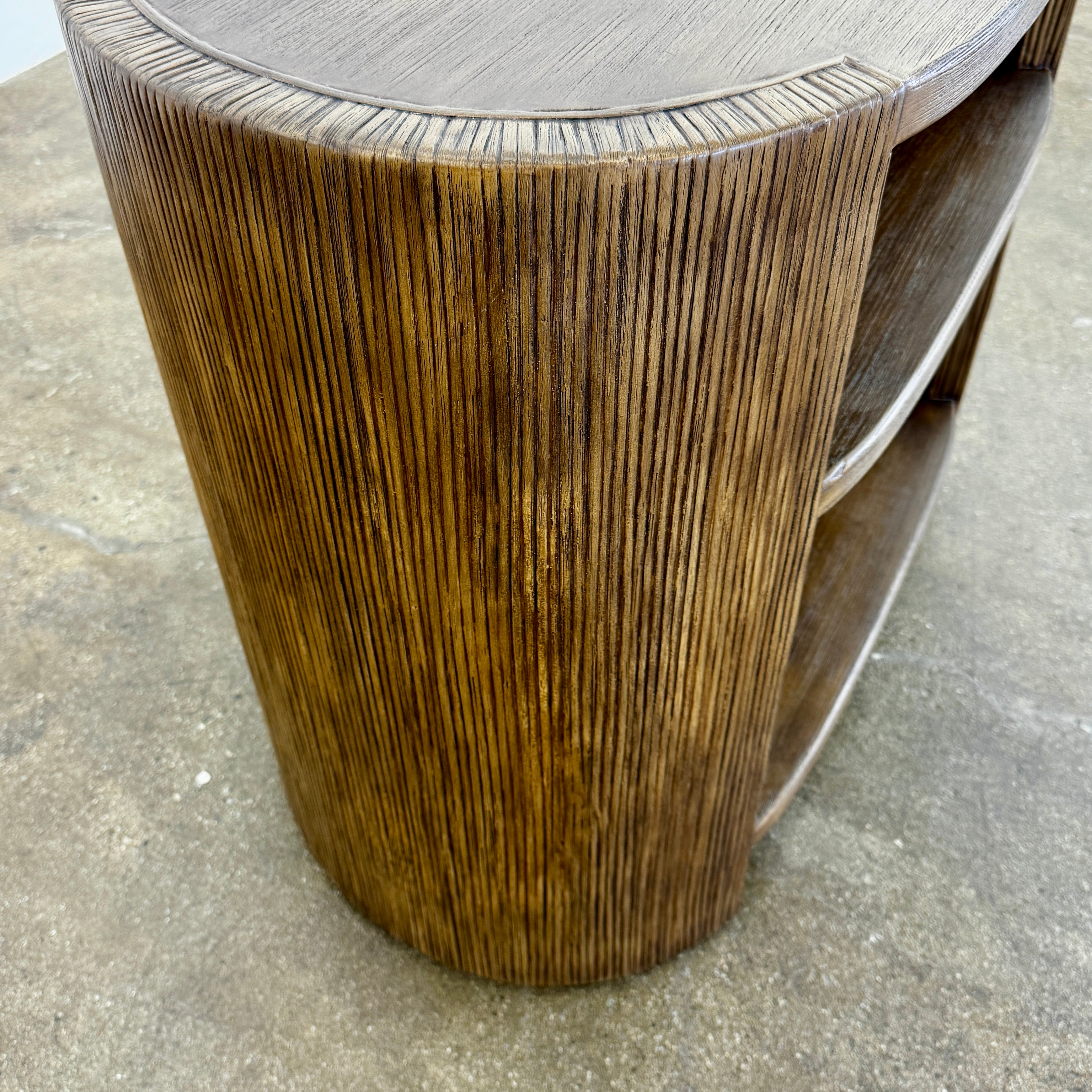 The Palachek Leonardo Side Table, Large, by Palachek features artisan craftsmanship, a dark brown finish, two shelves, and an open minimalist design that suits any contemporary decor against a plain white background.
