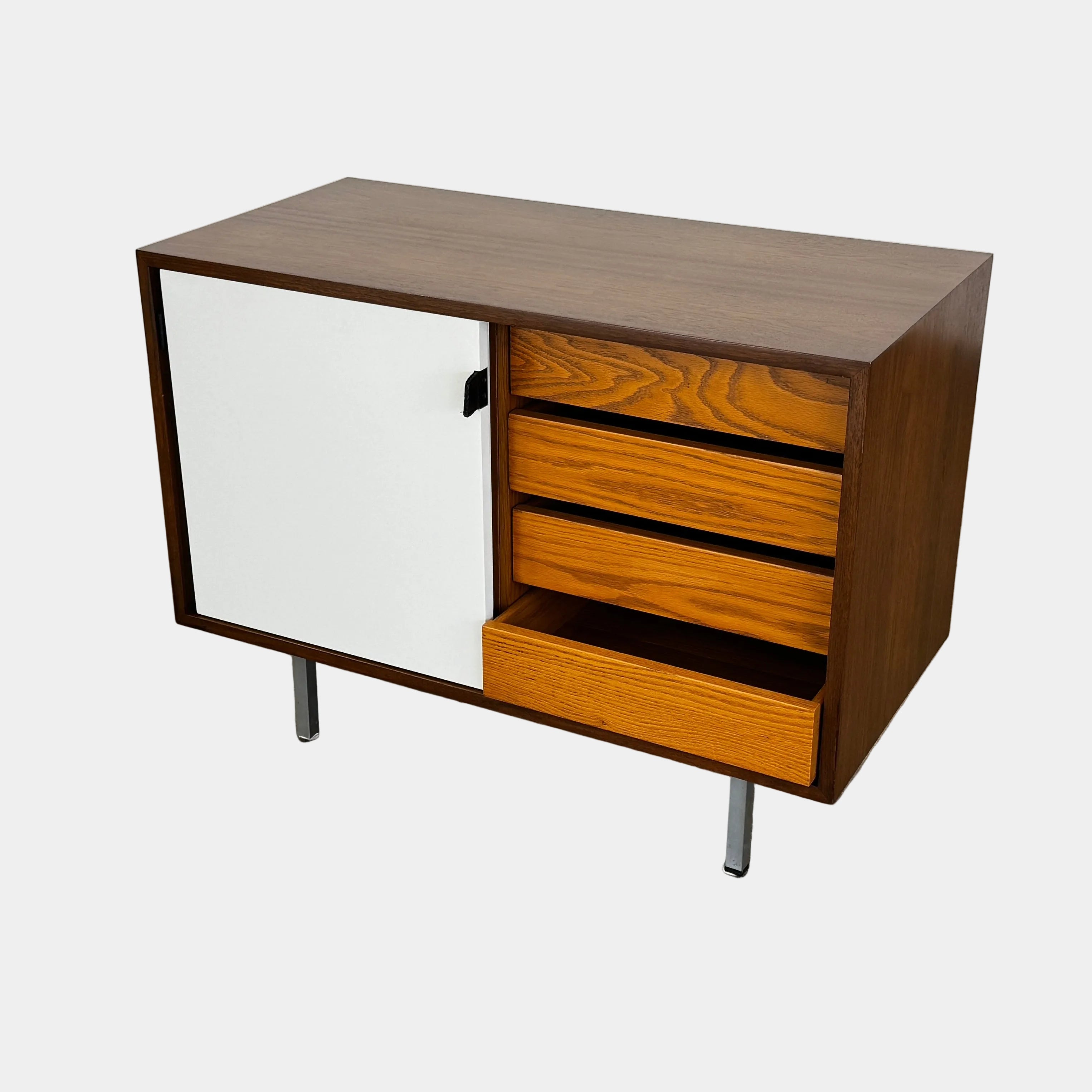 The Knoll Vintage Florence Knoll Office Storage features a dark wood frame, white sliding doors, and metal legs—perfect as a stylish credenza or office storage against a plain white wall.