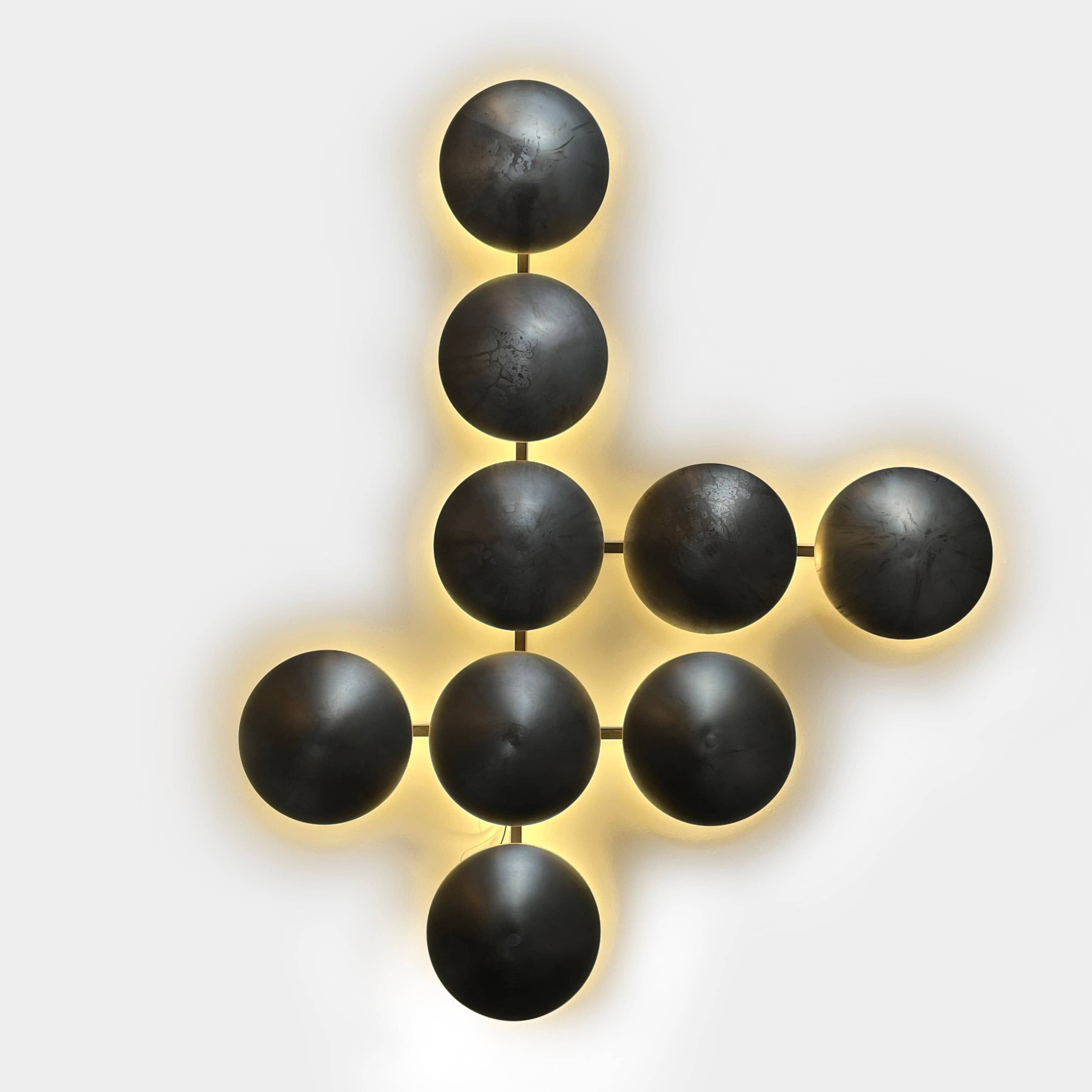 A group of Henge Wall Clips Light on a white background.