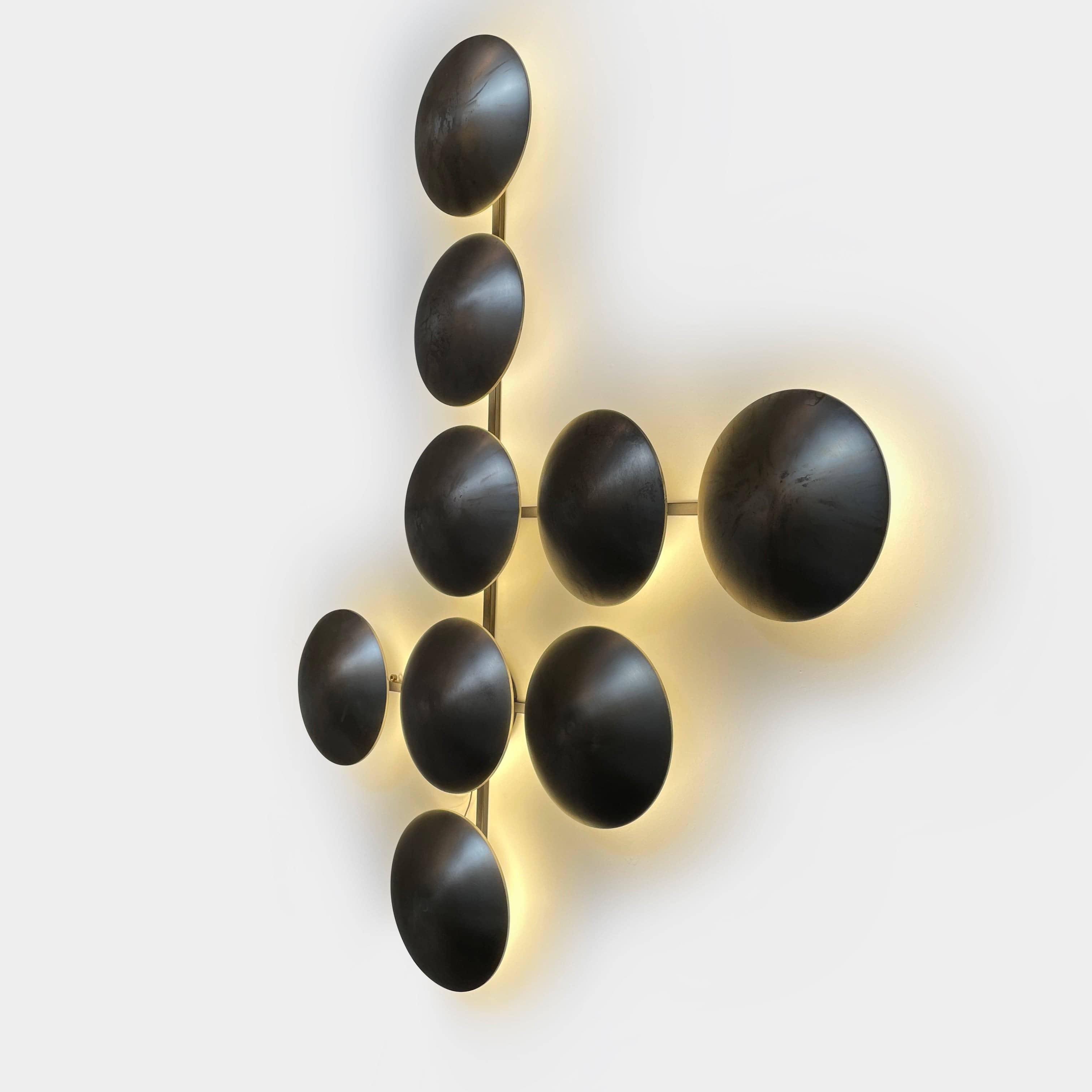 A group of Henge Wall Clips Light on a white background.