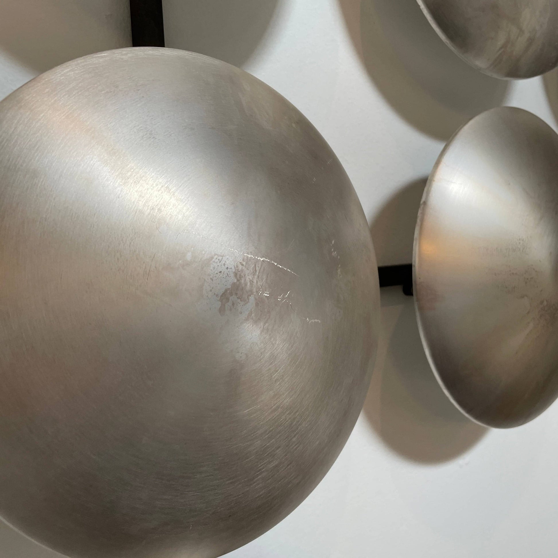 A group of Henge Wall Clips Light on a white background.