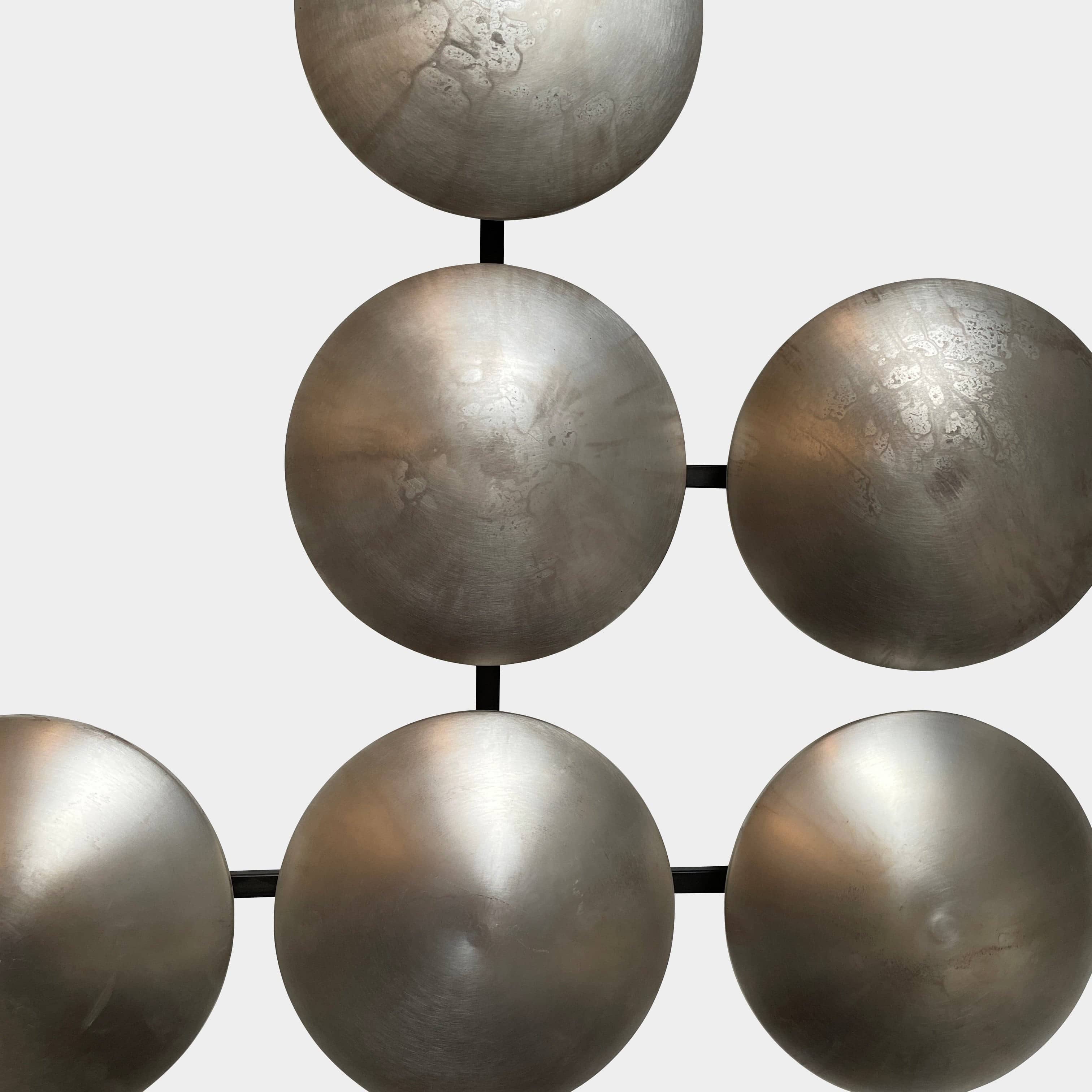 A group of Henge Wall Clips Light on a white background.