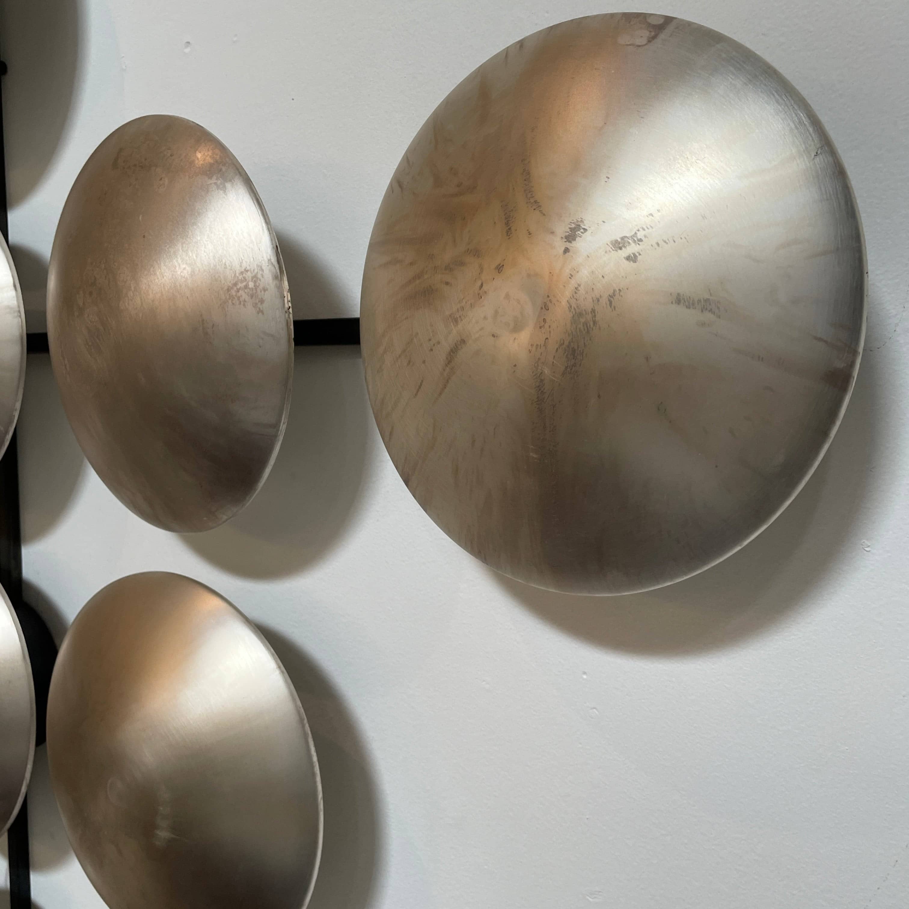 A group of Henge Wall Clips Light on a white background.