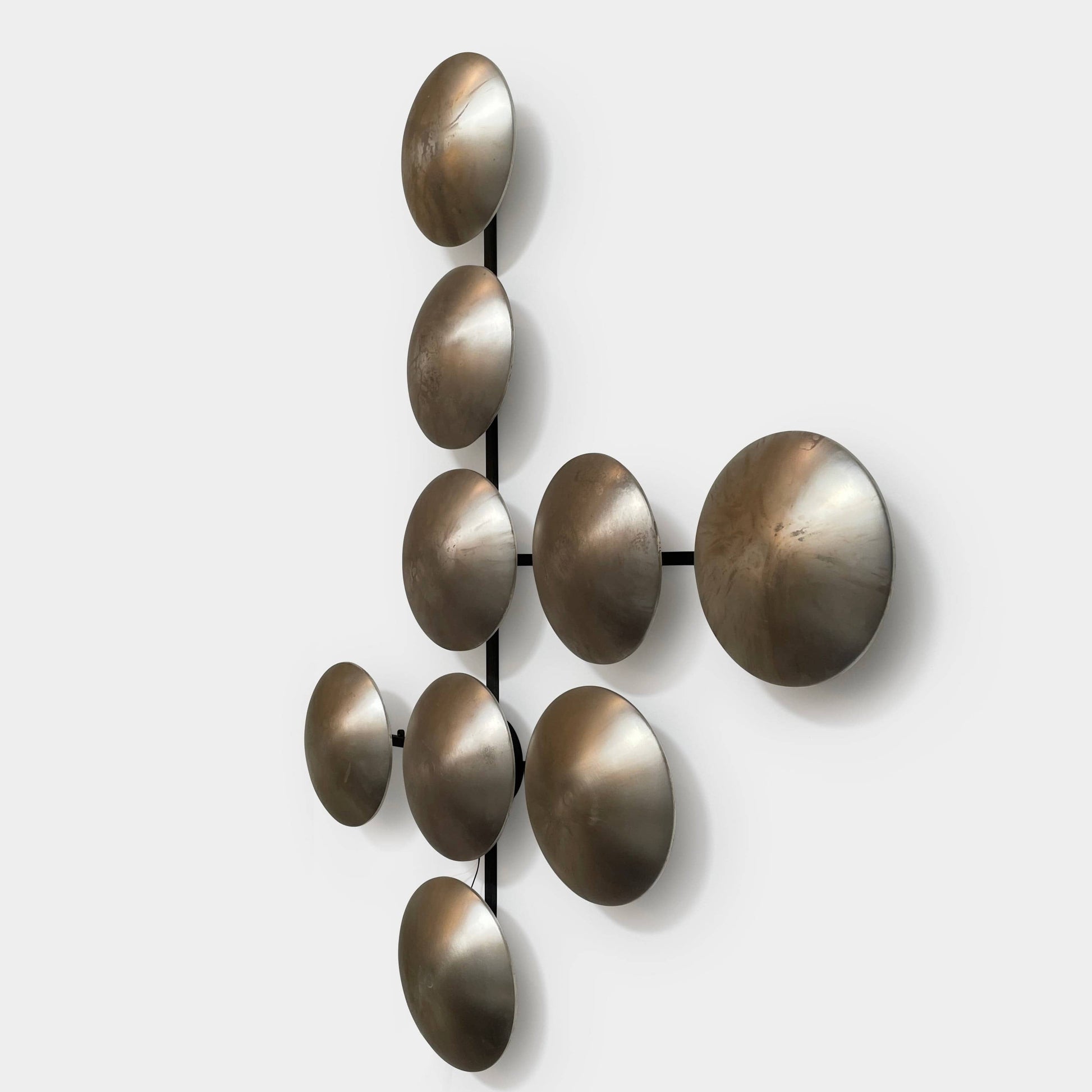 A group of Henge Wall Clips Light on a white background.