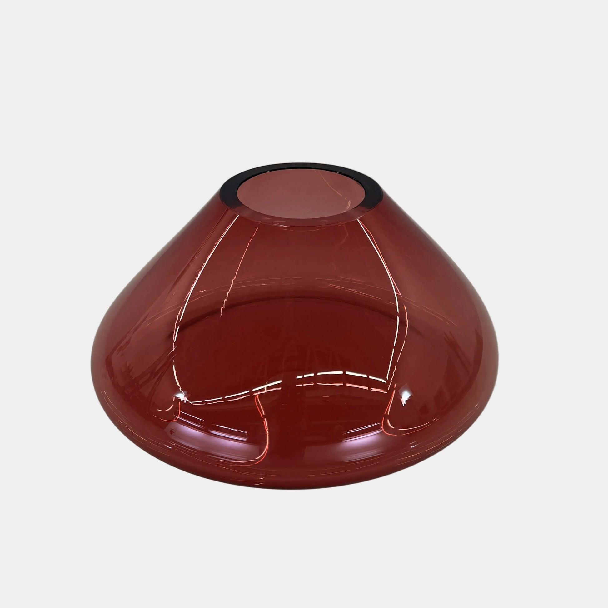 The Arcade Pink Murano Glass Vase by Arcade features pink, hand-blown elegance inspired by Venetian glassmaking, showcased against a plain white background.