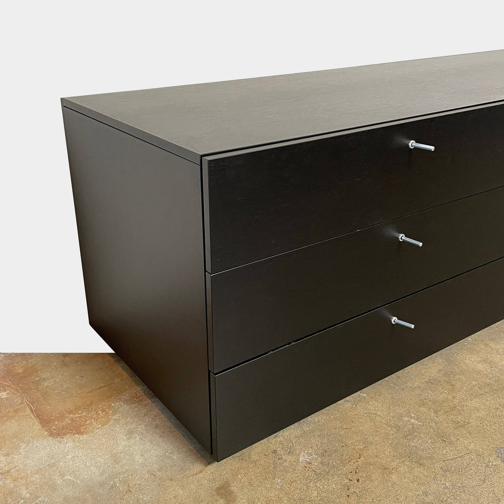 A black Cassina Flat 255-256 Storage System double chest of drawers against a white background.
