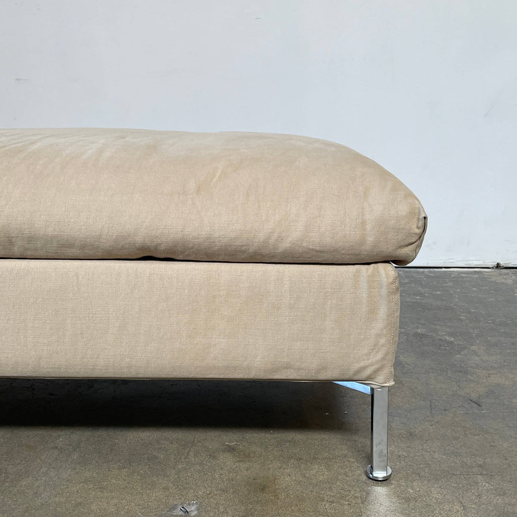 A modern Living Divani Box Ottoman in beige with metal legs isolated on a white background.