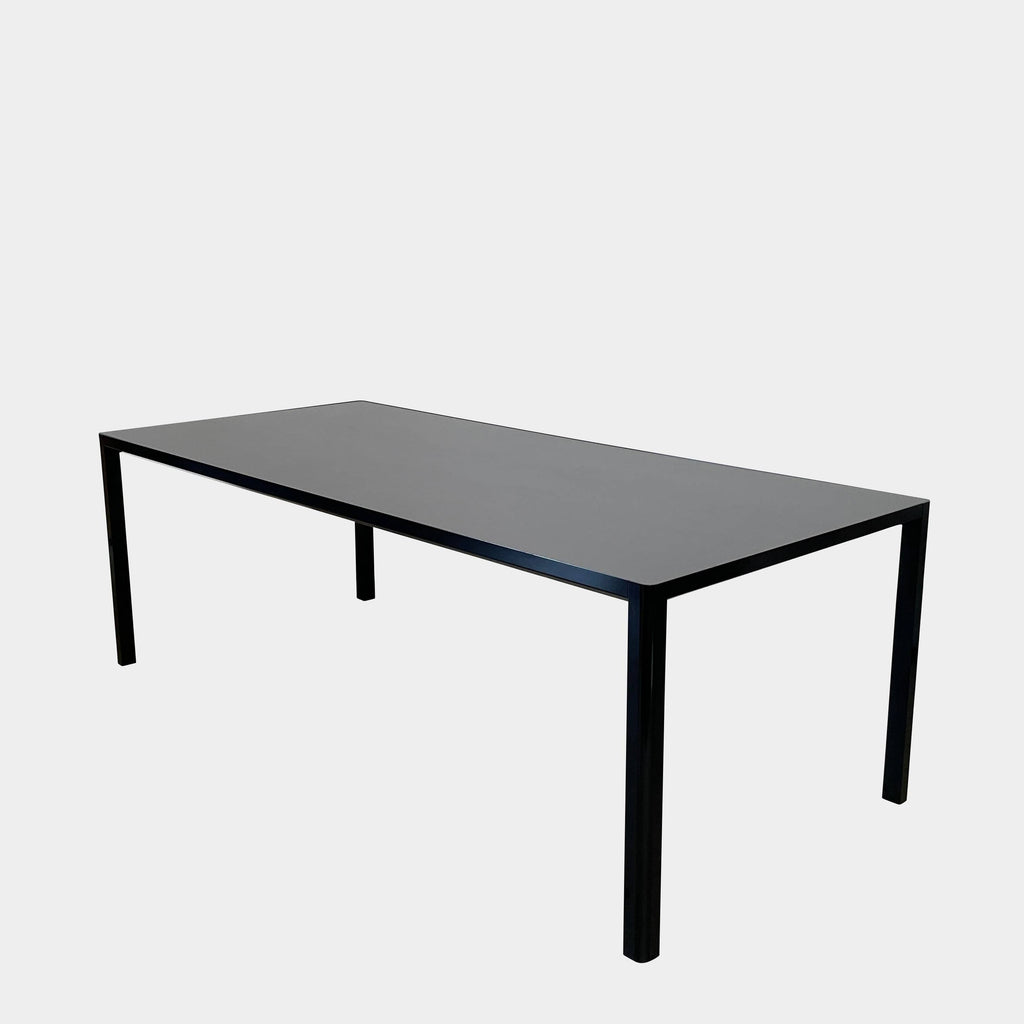 A simple Ligne Roset Seram Dining Table on a white background.