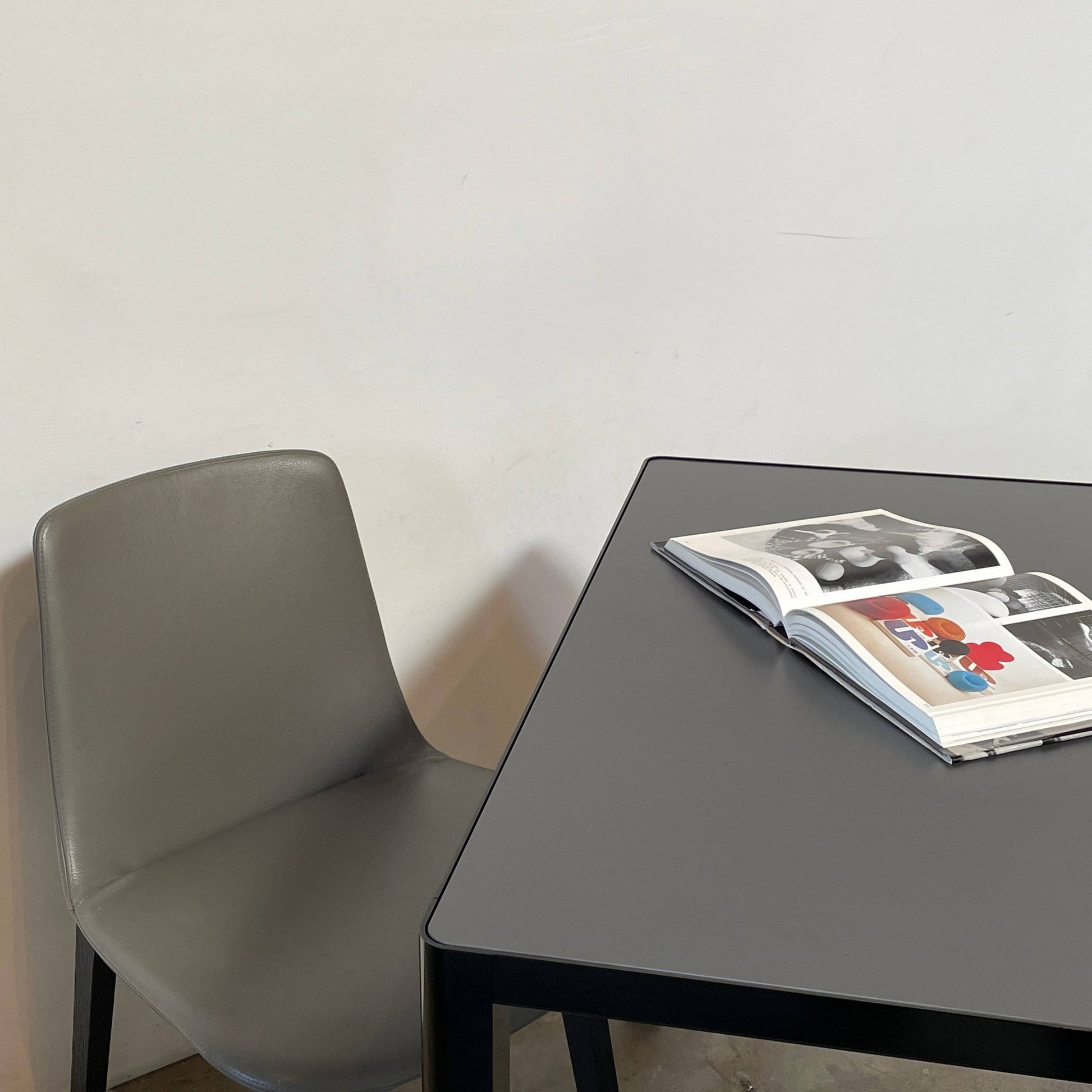 A simple Ligne Roset Seram Dining Table on a white background.