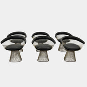 A set of six Knoll Platner Armchairs by Knoll, featuring black seats and backs with metal wire bases, inspired by modernist design, arranged in two rows against a plain white background.