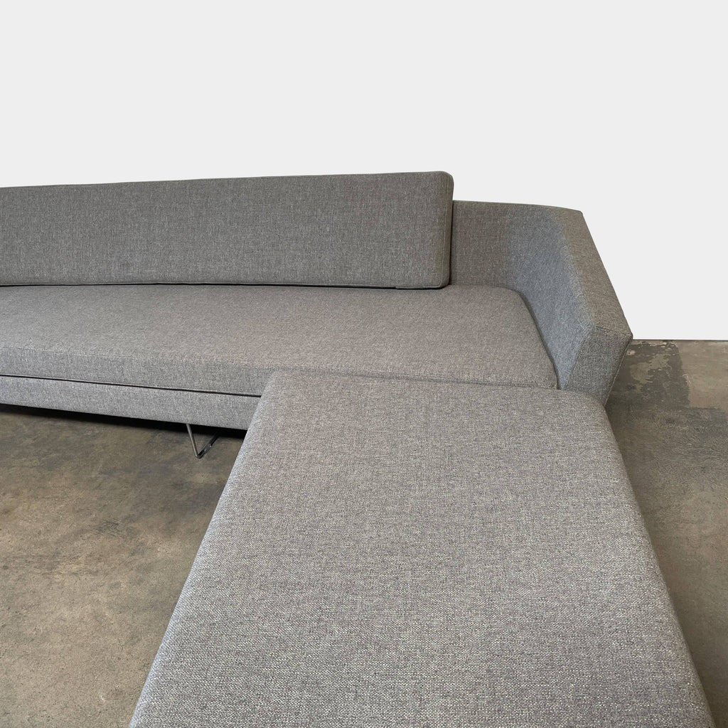 A David Weeks Studio Sculpt 513 sectional sofa with a metal base.