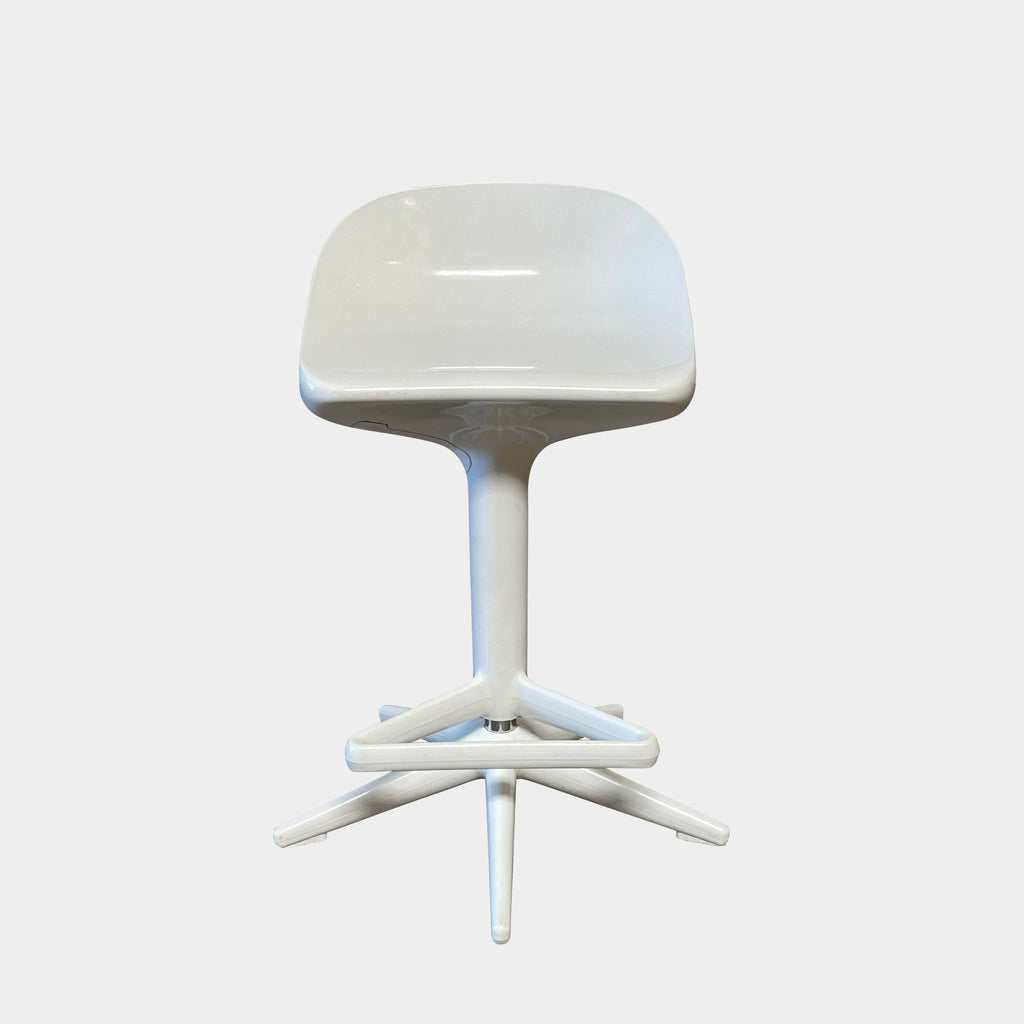 A set of four Kartell Spoon Swivel Stools on a white background.