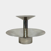 An Enzo Mari-inspired, tiered metal Driade Silver Fruit Stand Centerpiece with a reflective silver finish, isolated on a white background.