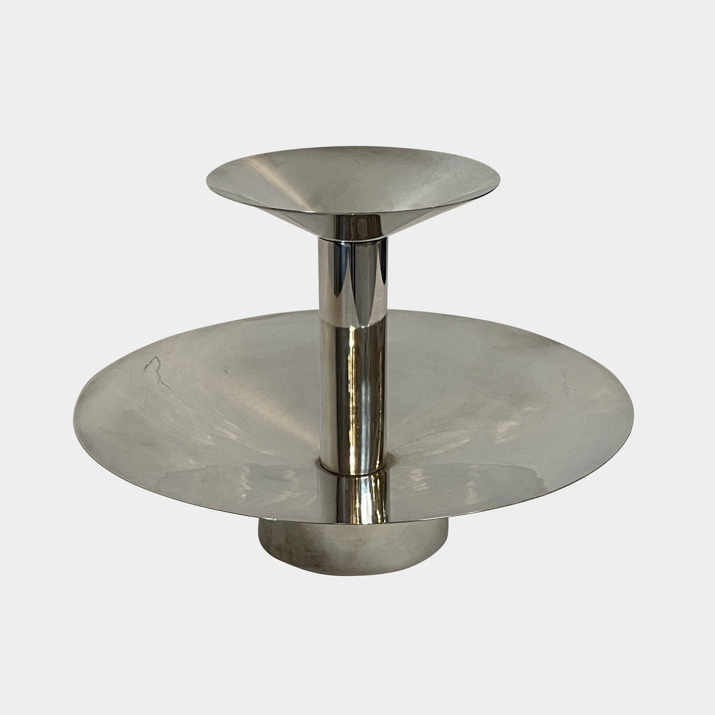 An Enzo Mari-inspired, tiered metal Driade Silver Fruit Stand Centerpiece with a reflective silver finish, isolated on a white background.
