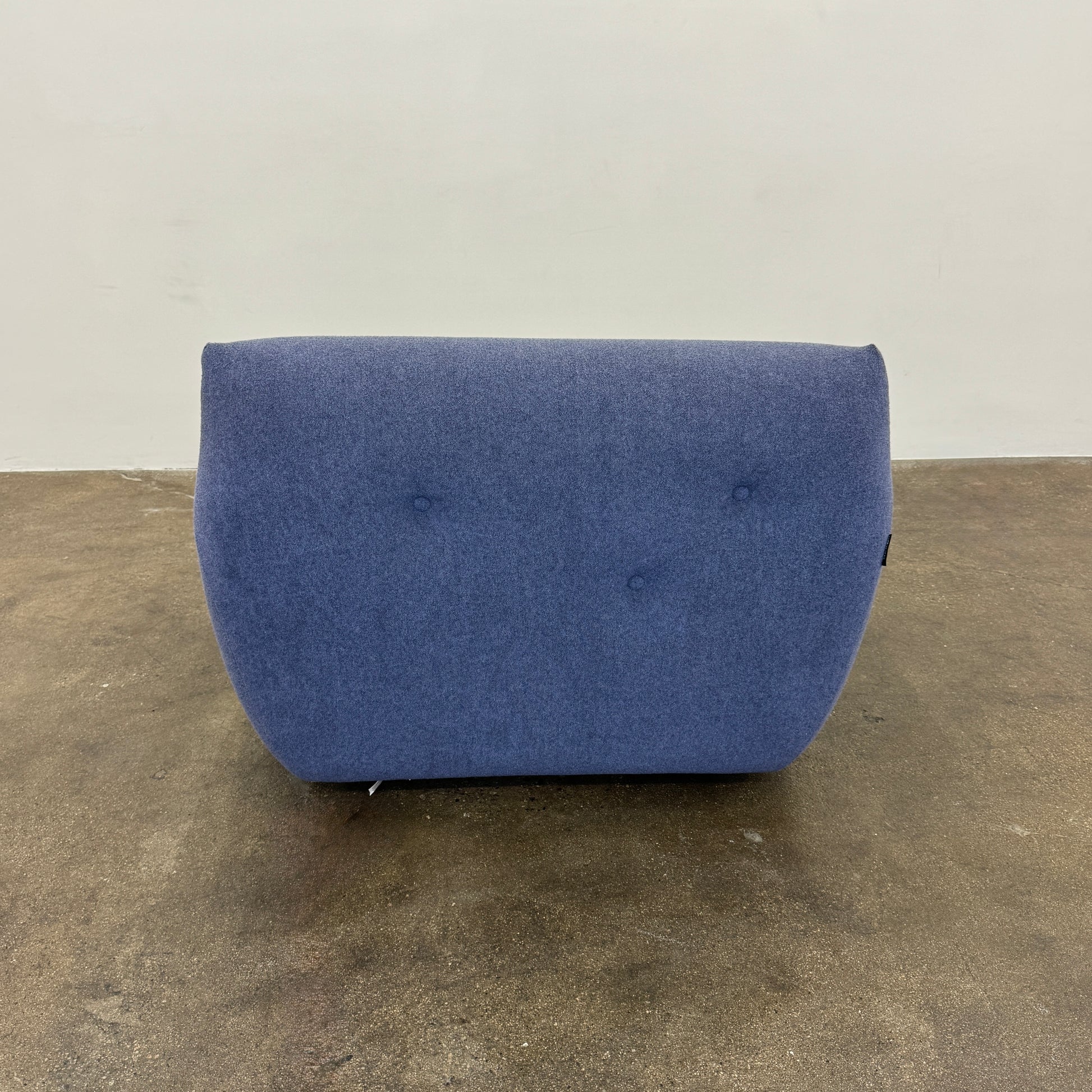 The Roche Bobois Informel Outdoor Armchair Low Back - Bleuet is a modern blue armchair with tufted buttons and plush comfort, shown against a white background.