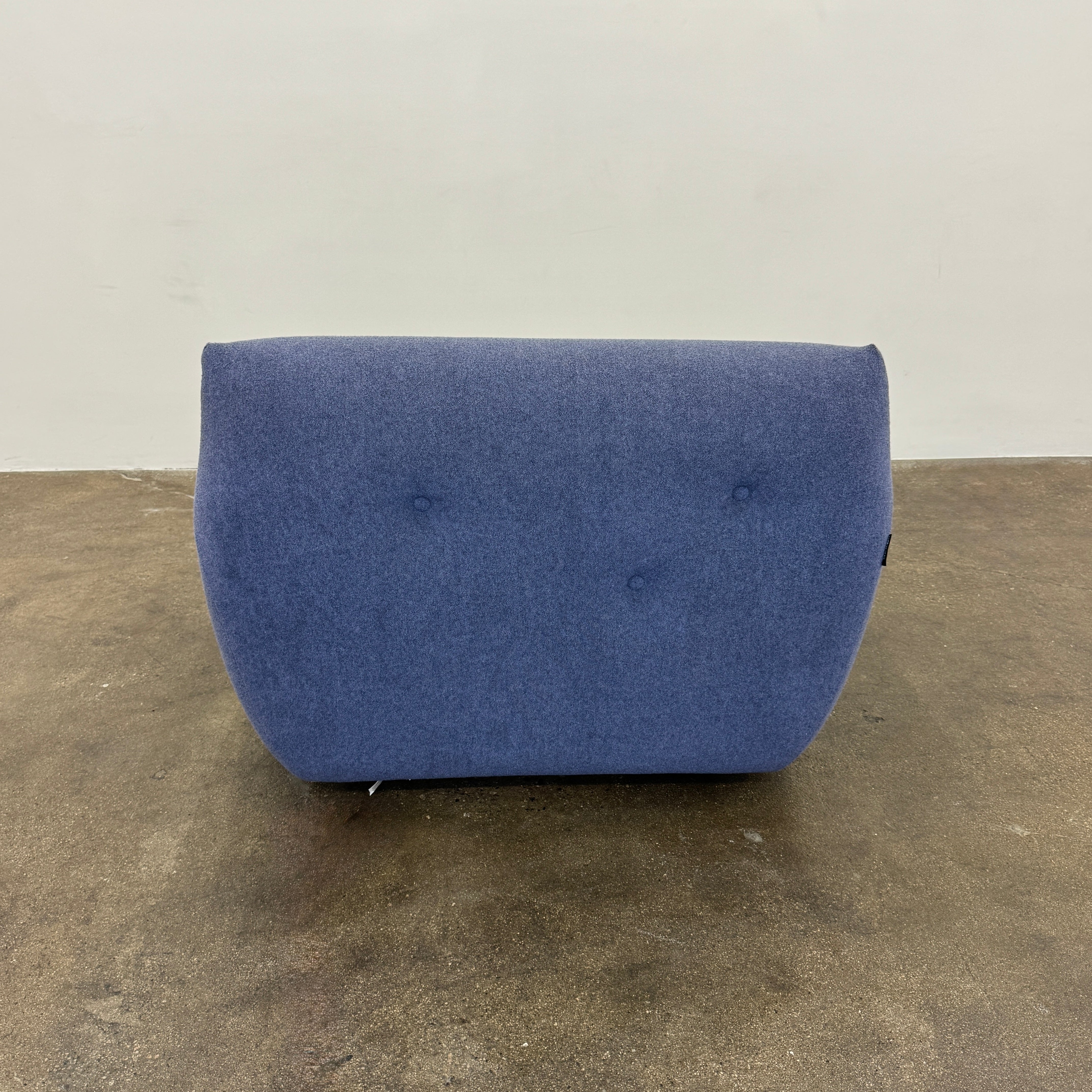 The Roche Bobois Informel Outdoor Armchair Low Back - Bleuet is a modern blue armchair with tufted buttons and plush comfort, shown against a white background.