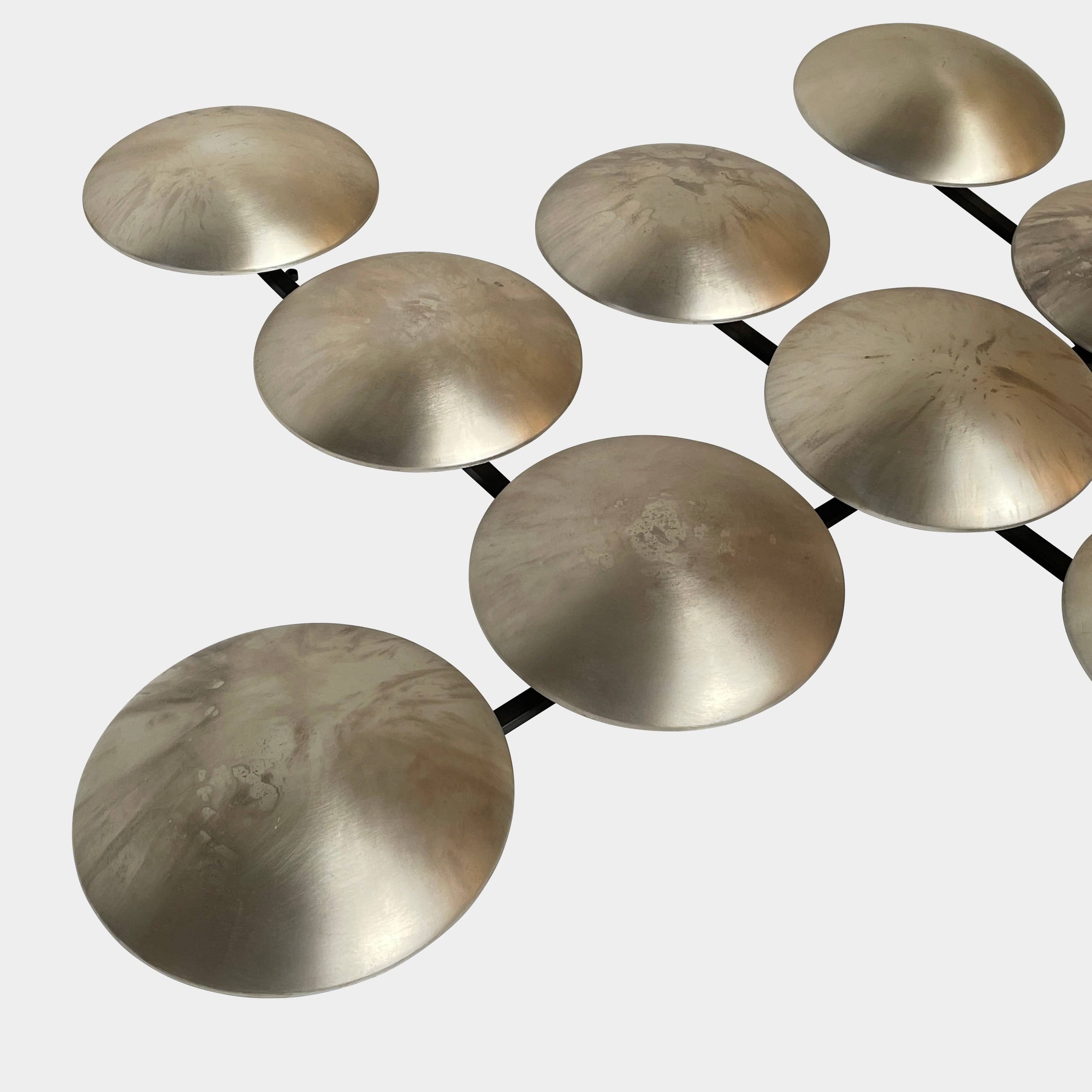 A group of Henge Wall Clips Light on a white background.