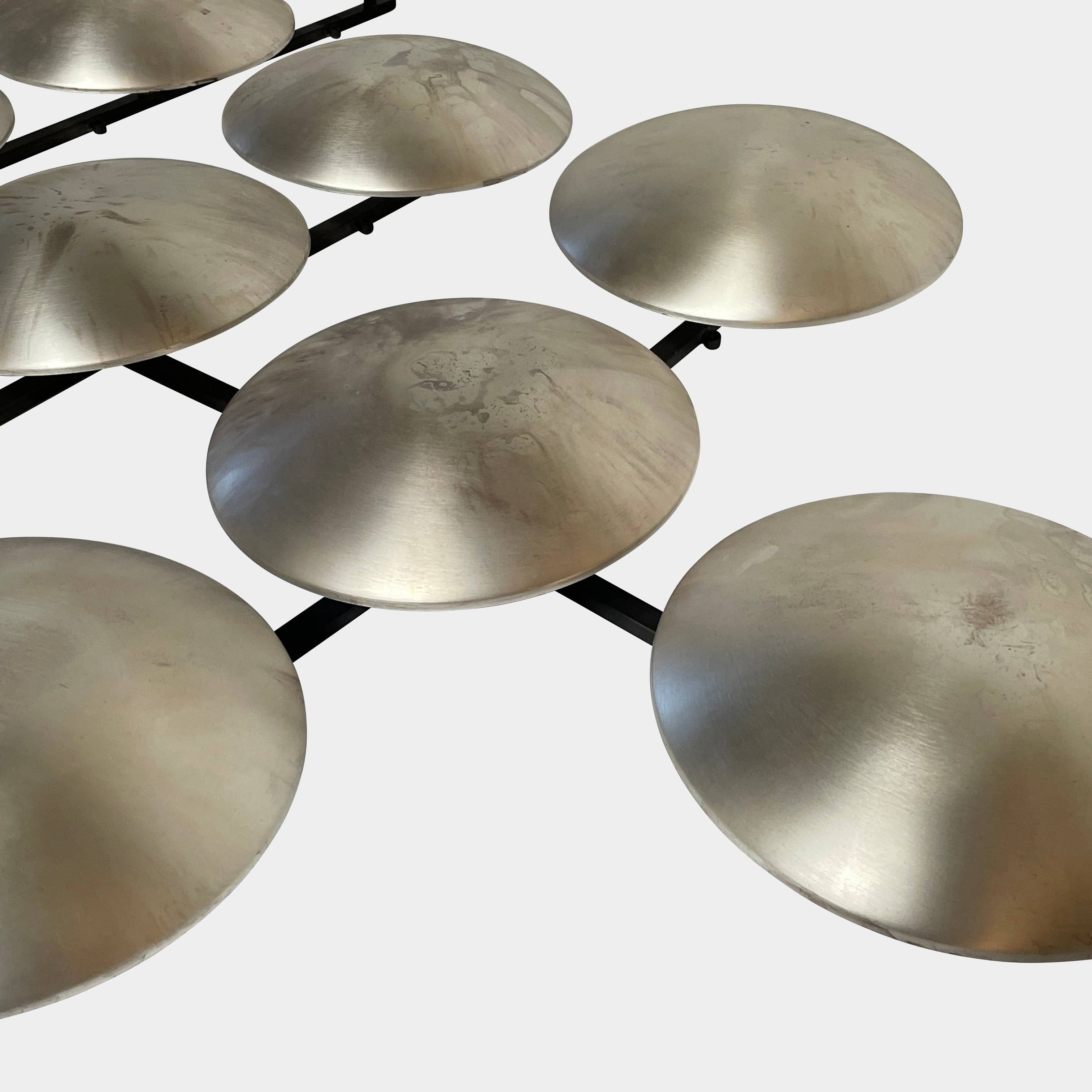 A group of Henge Wall Clips Light on a white background.