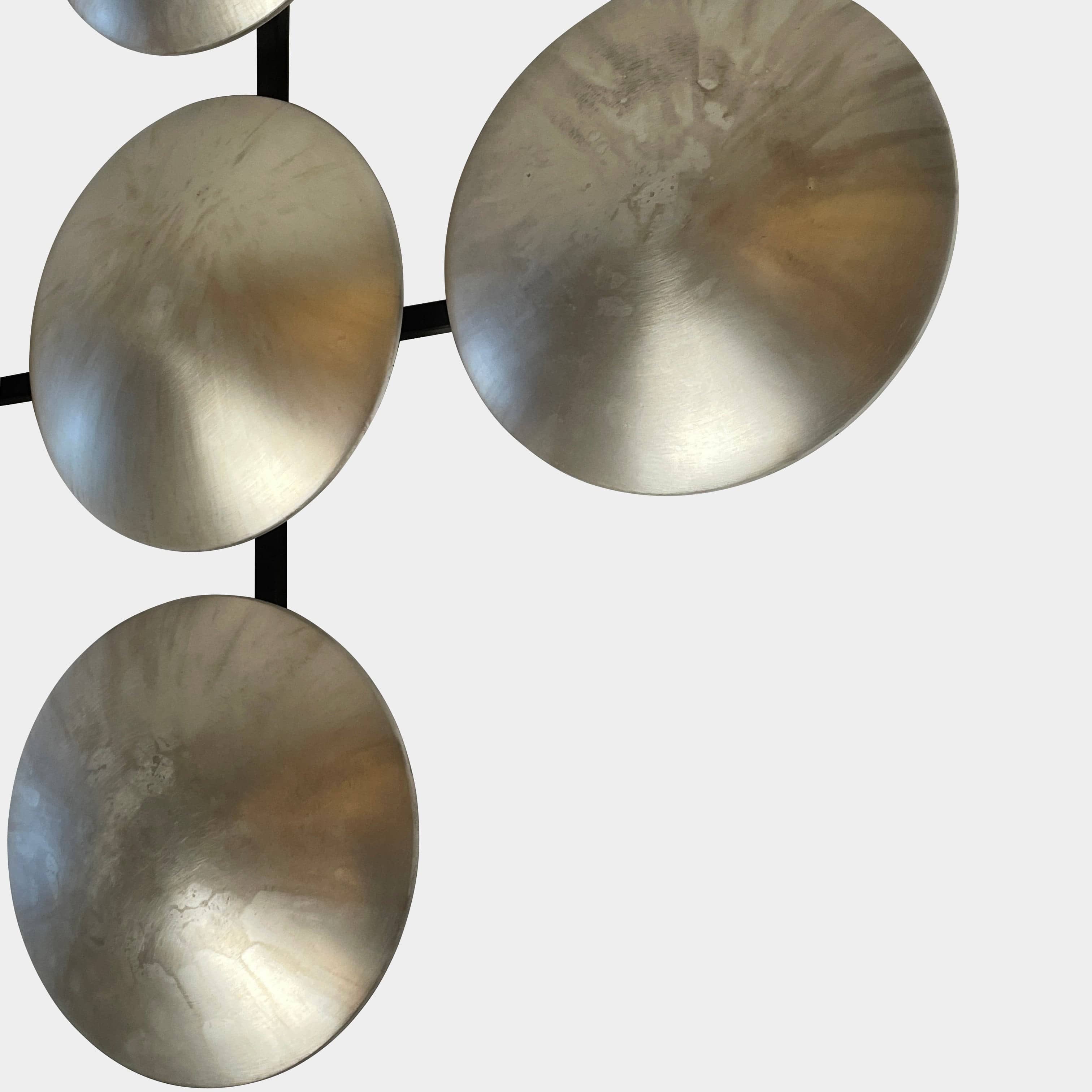 A group of Henge Wall Clips Light on a white background.