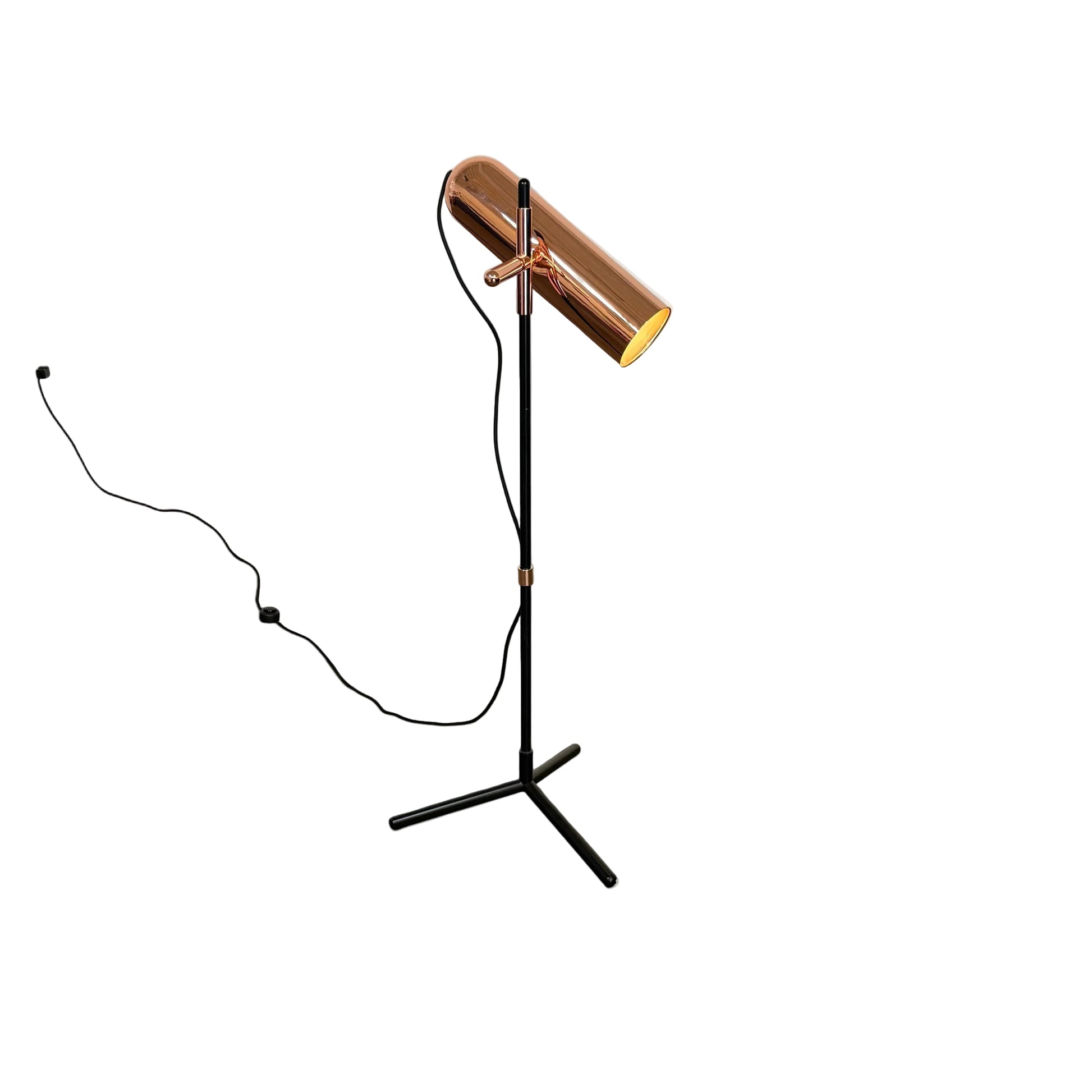 The Roche Bobois Wander Floor lamp features a cylindrical copper shade, black stand, and tripod base with attached power cord—an elegant, modern addition inspired by Roche Bobois design.