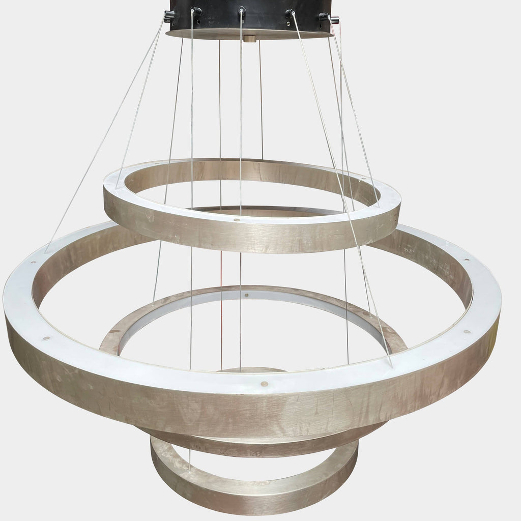 A Henge Light Ring Chandelier with a circular shape hanging from it.