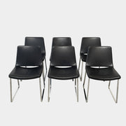 Five black B&B Italia Metropolitan dining chairs designed by Jeffrey Bernett, arranged in a row on a white background.