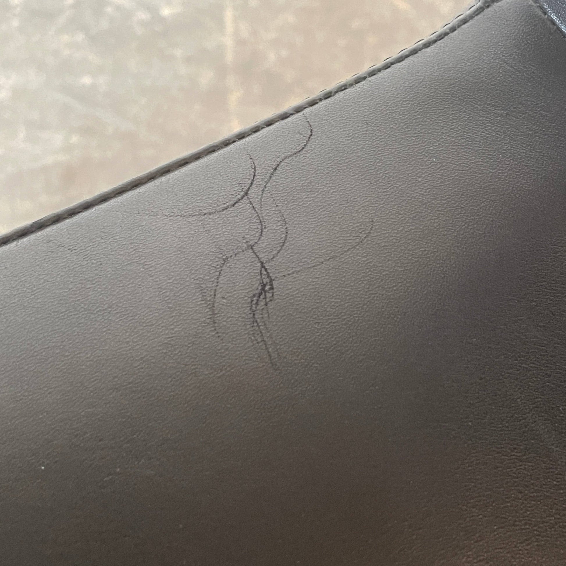 Five black B&B Italia Metropolitan dining chairs designed by Jeffrey Bernett, arranged in a row on a white background.