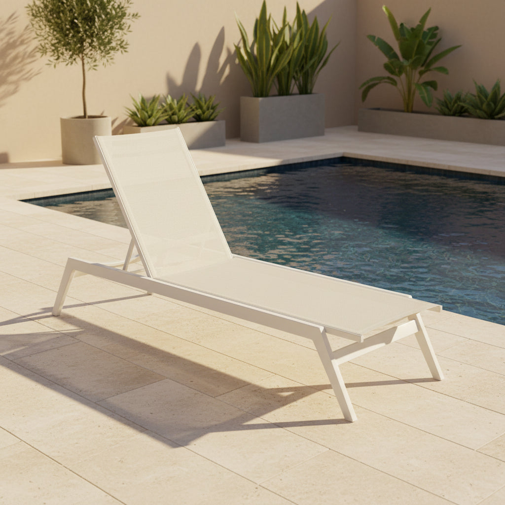 The Serge Ferrari Sun Lounger is a white, modern piece with an adjustable backrest, crafted from metal and mesh using durable Serge Ferrari fabric, shown on a plain white background.