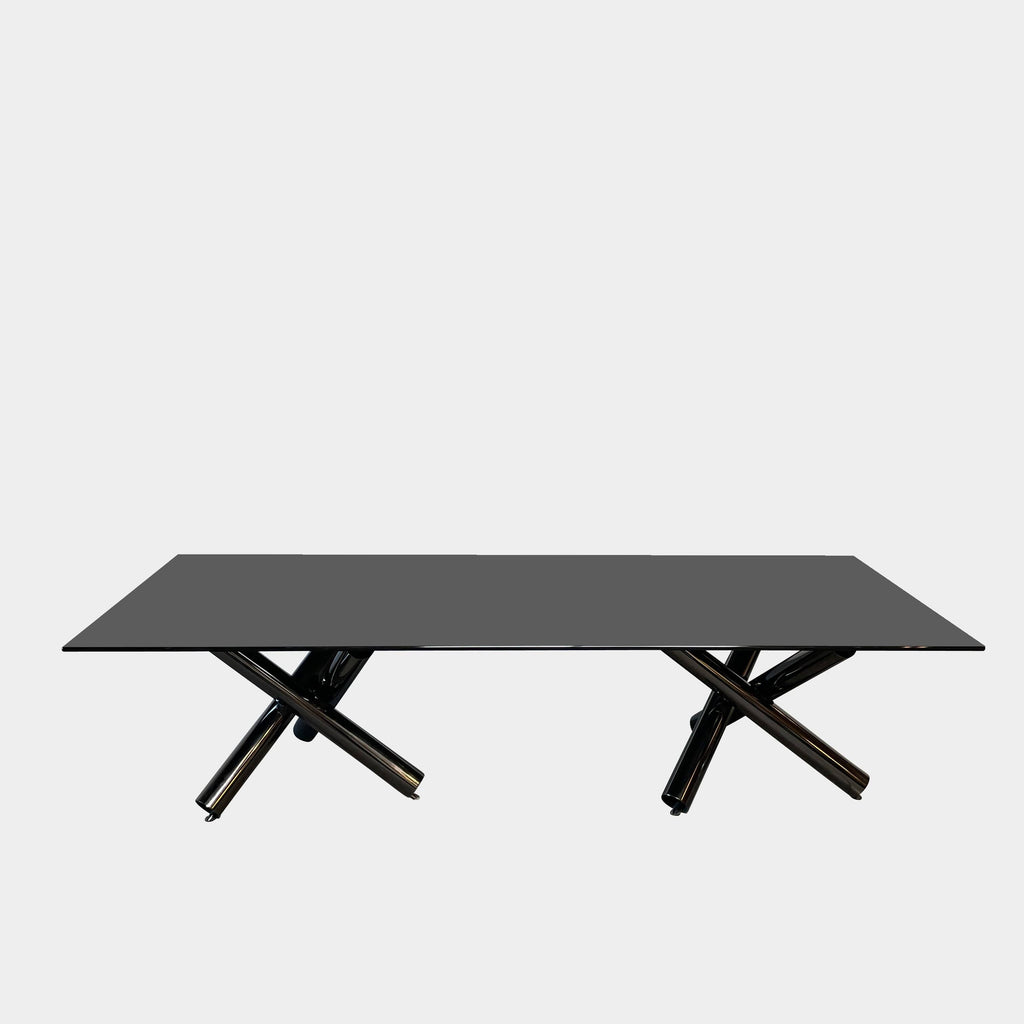 A Minotti Van Dyck Dining Table with black legs on a white background.