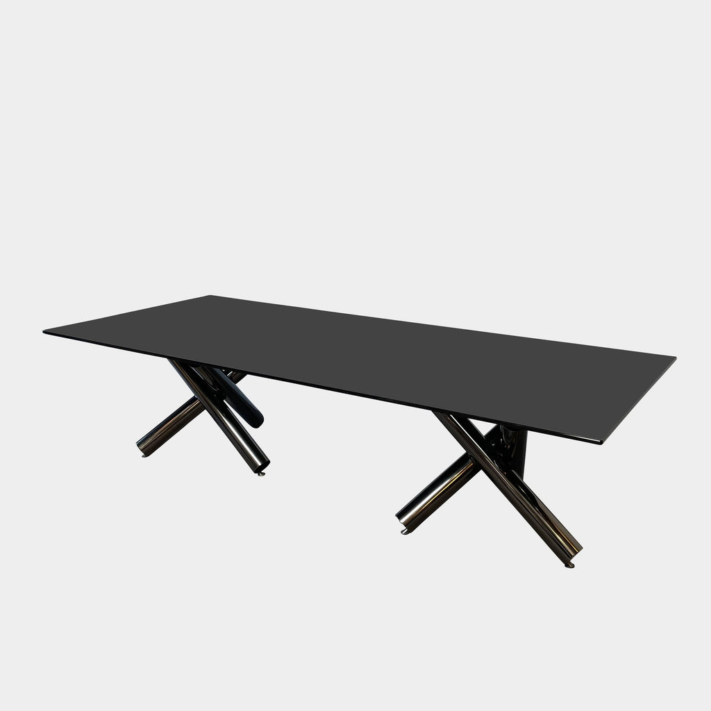 A luxurious Minotti Van Dyck Dining Table with black legs designed by Rodolfo Dordoni on a white background.