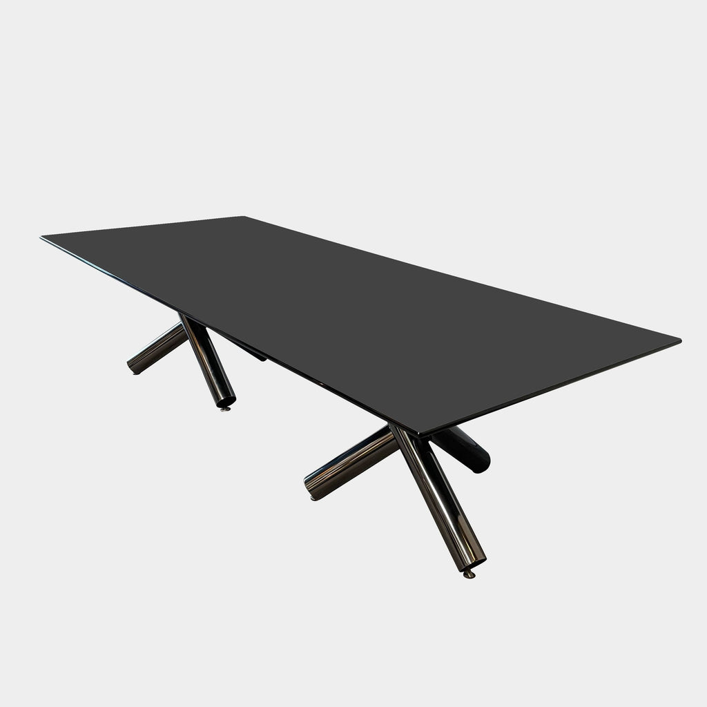 A Minotti Van Dyck Dining Table with black legs on a white background.