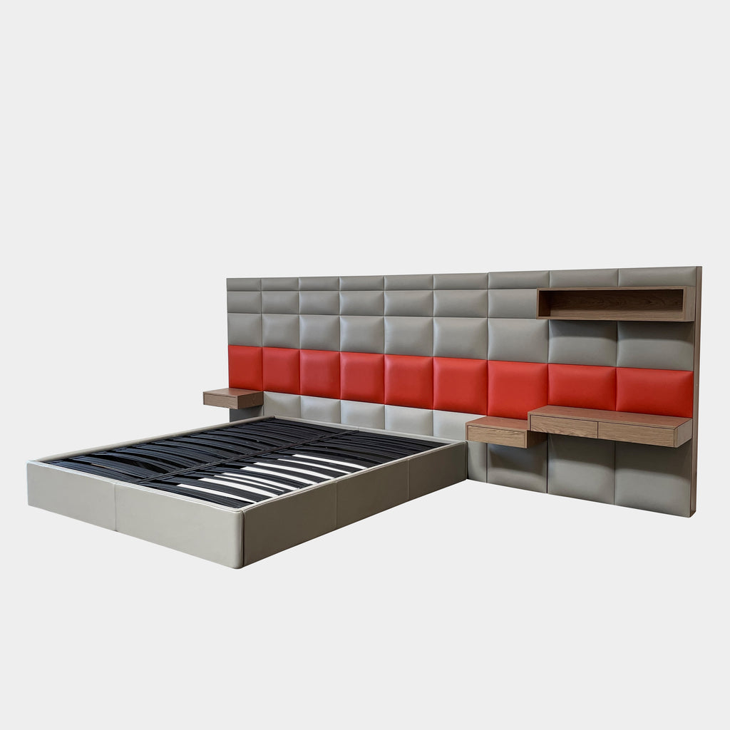 A modern Roche Bobois Courchevel Bed with Storage - Cal King (ON HOLD), padded bed frame with a quilted headboard in beige and red, featuring built-in wooden shelves and side tables, available in Cal King size.