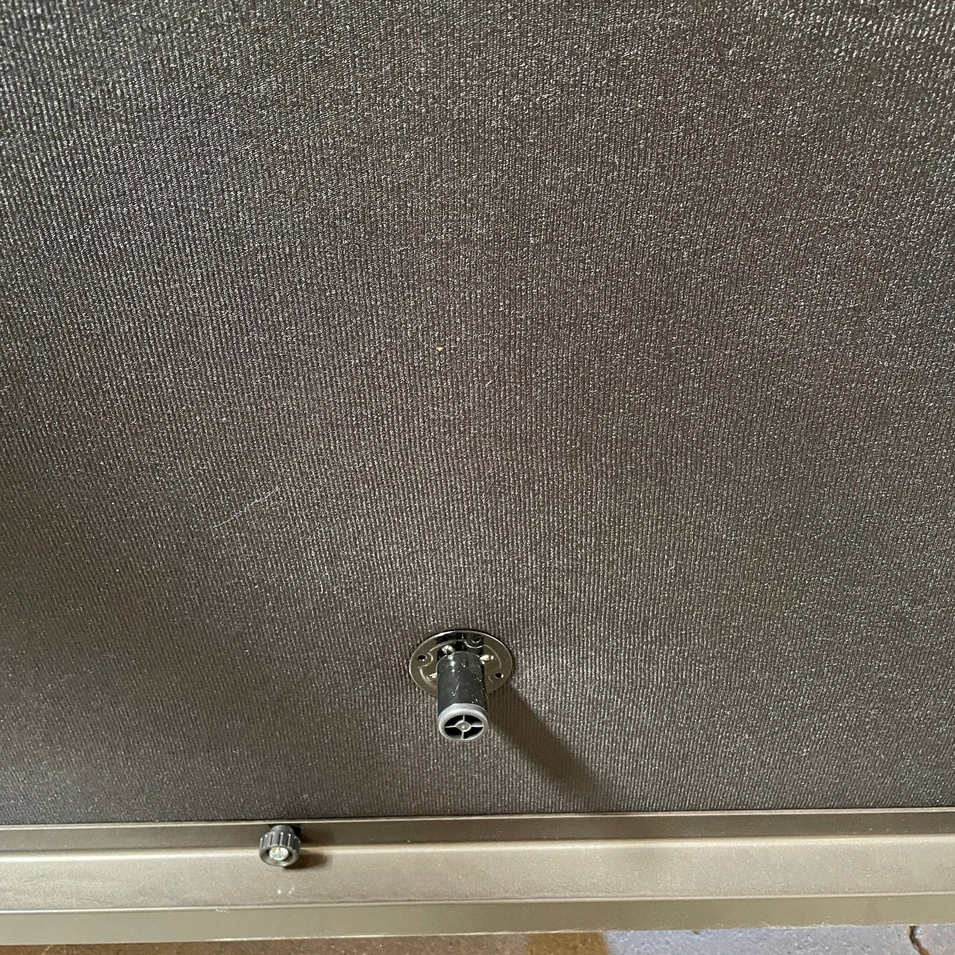 A Minotti Hamilton Black Leather Sofa with multiple cushions, designed by Rodolfo Dordoni, isolated on a white background.