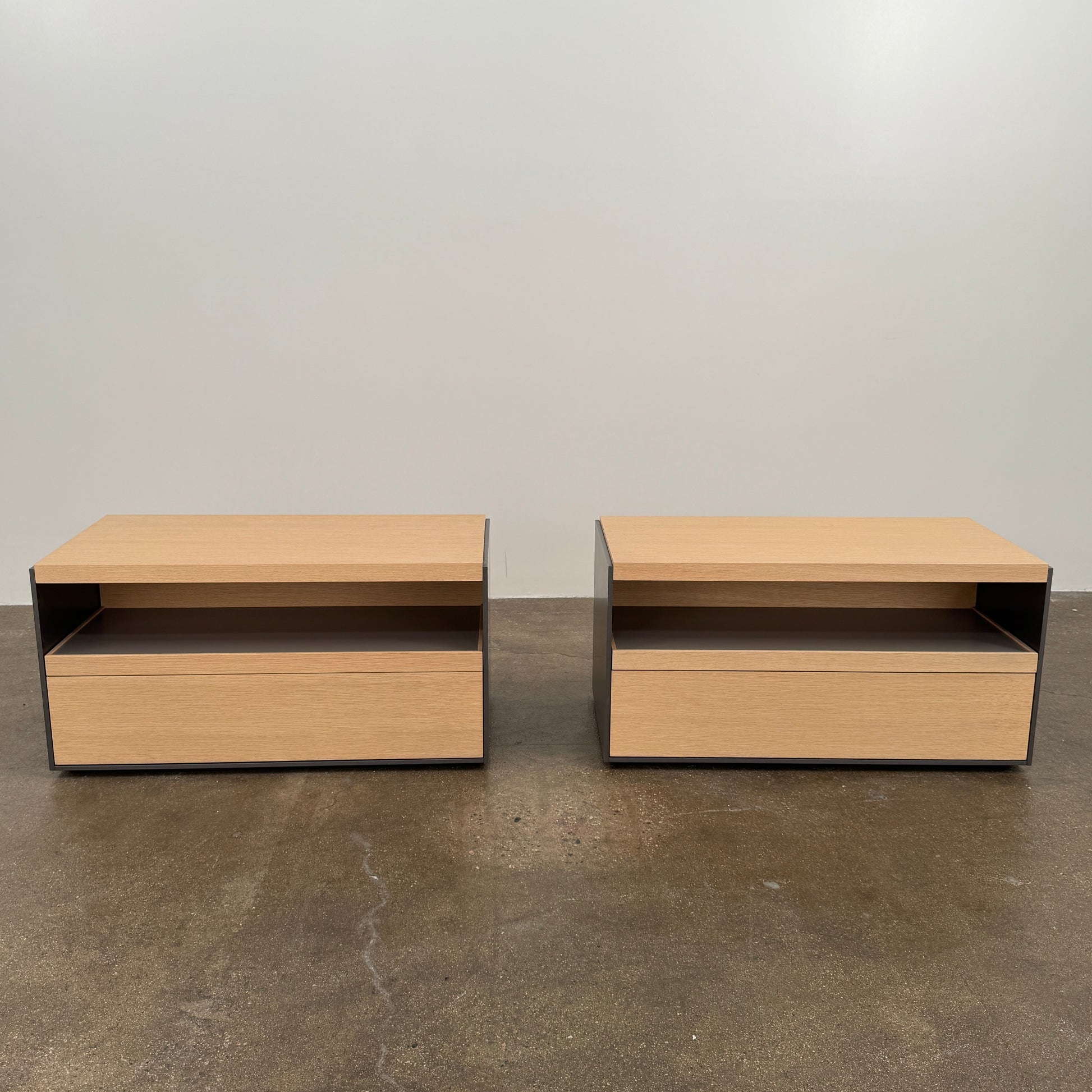 Set of 2 B&B Italia Surface Chest of Drawers with pull-out shelves, featuring light wood tops, open shelves, and lower drawers, displayed against a plain white background.